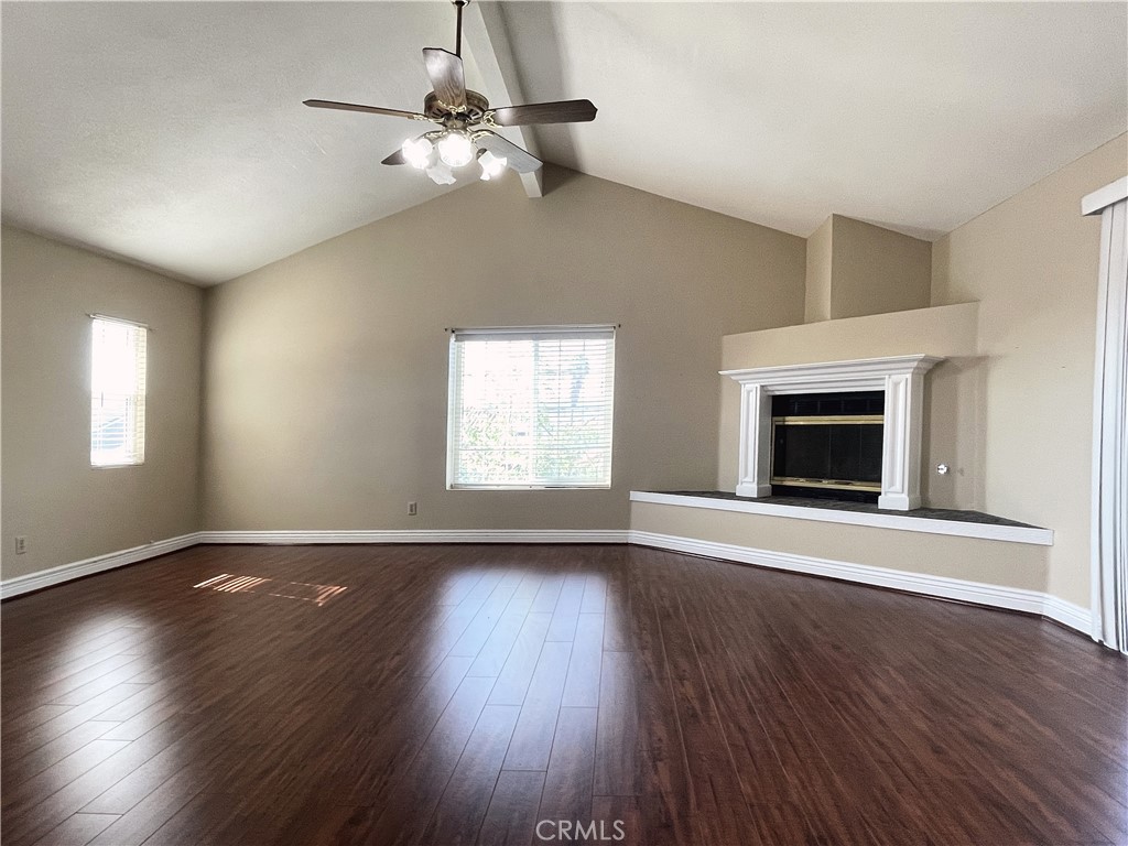 20665 Fuero Drive Walnut, CA 91789 - Photo 42 of 47 a view of an empty room with wooden floor fireplace and a window