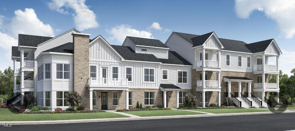 a view of a white building among the street