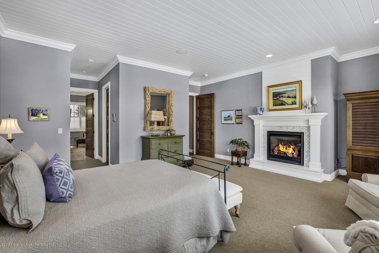 87 Diamond A Ranch Road Carbondale, CO 81623 - Photo 20 of 50 a bedroom with furniture and a fireplace