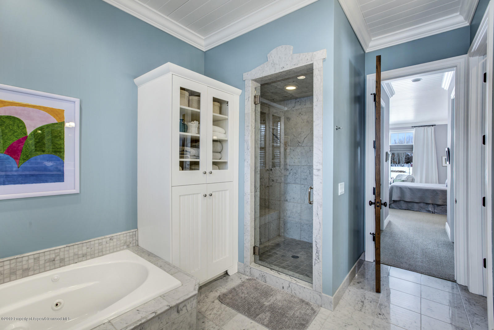 87 Diamond A Ranch Road Carbondale, CO 81623 - Photo 22 of 50 a bathroom with a bathtub and a shower