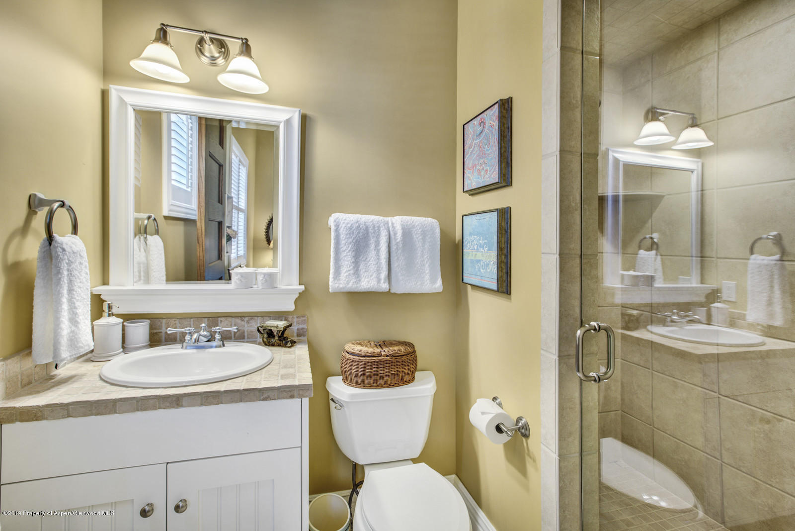 87 Diamond A Ranch Road Carbondale, CO 81623 - Photo 24 of 50 a bathroom with a toilet sink and mirror
