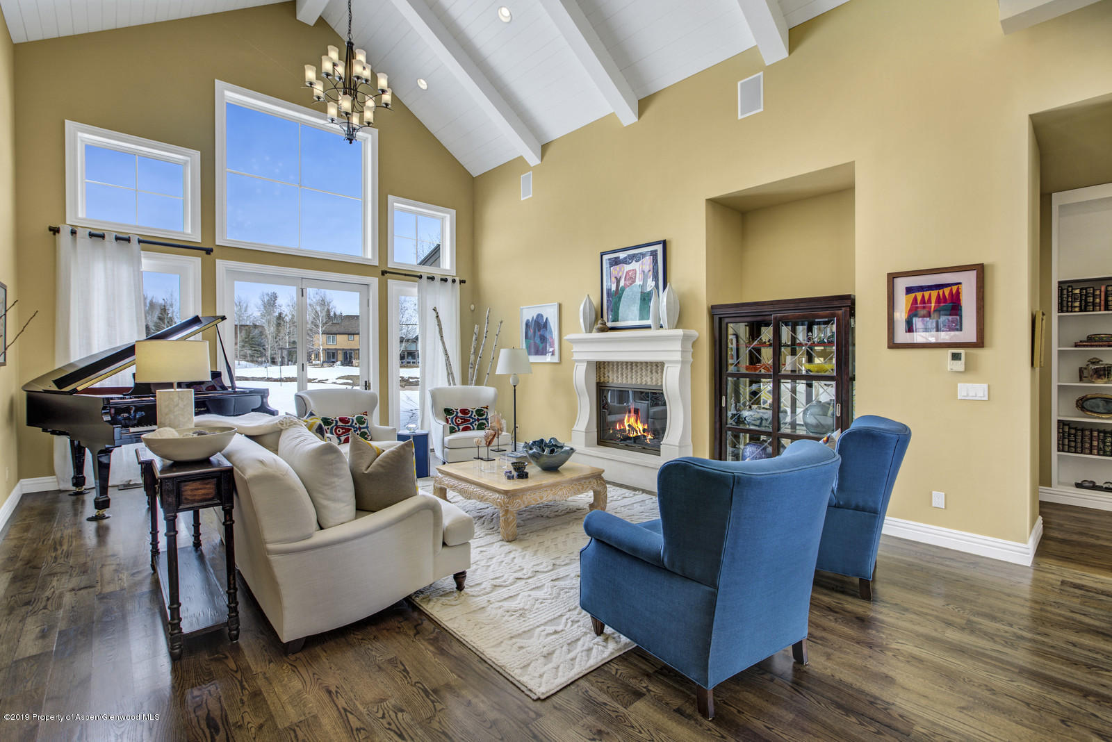 87 Diamond A Ranch Road Carbondale, CO 81623 - Photo 3 of 50 a living room with furniture fireplace and a large window