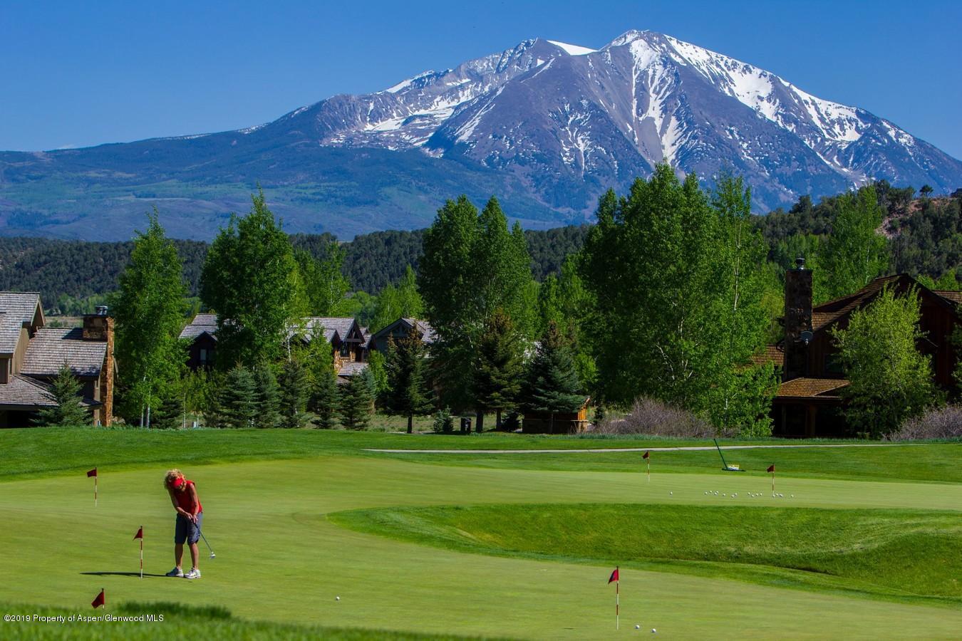 87 Diamond A Ranch Road Carbondale, CO 81623 - Photo 42 of 50 a view of a golf course with a house