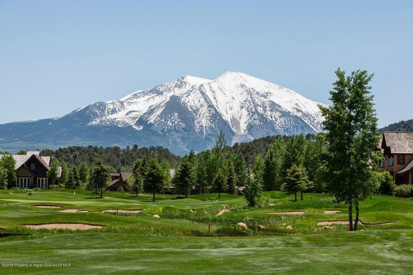87 Diamond A Ranch Road Carbondale, CO 81623 - Photo 49 of 50 a view of a golf course with a lake
