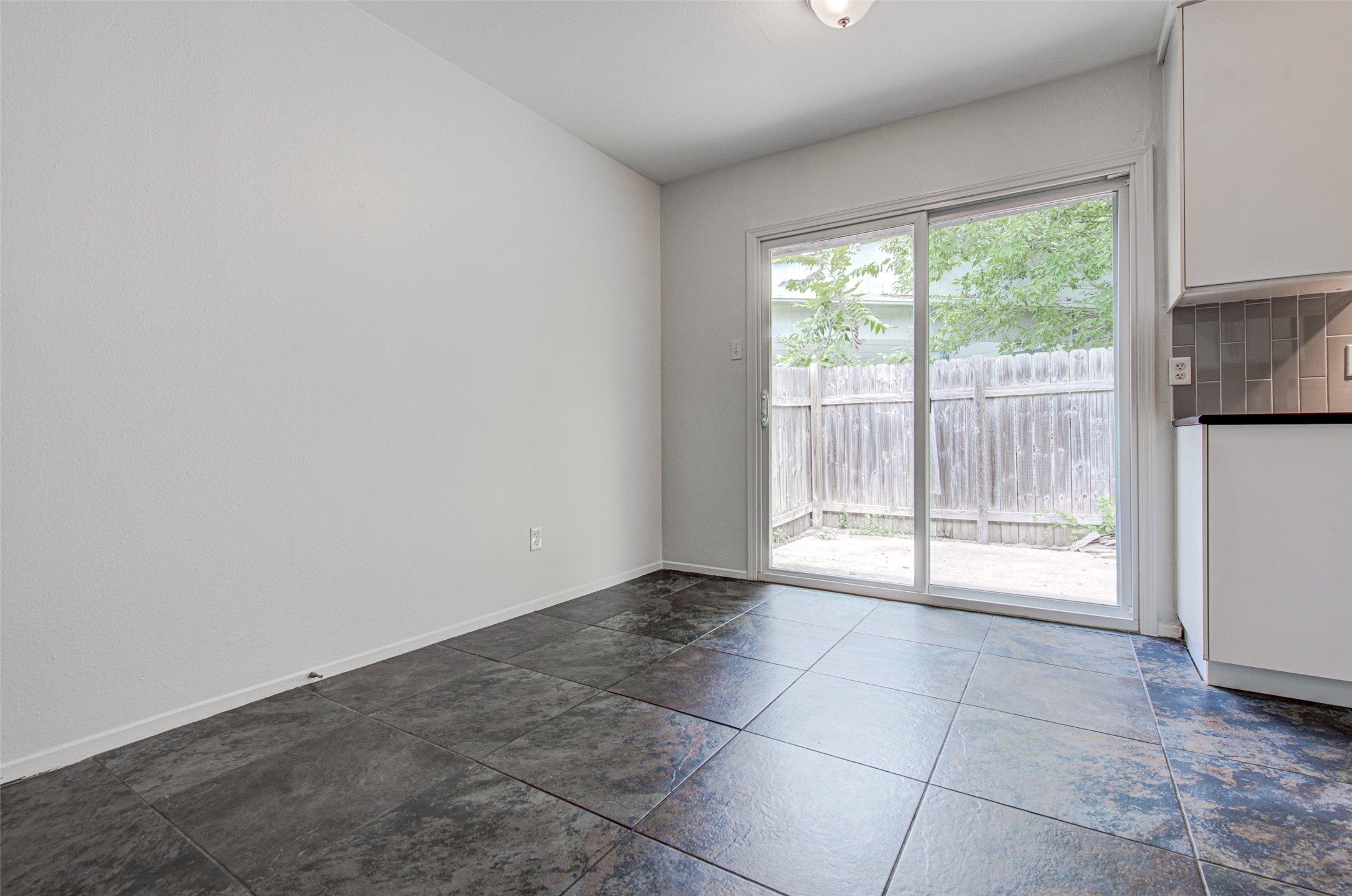 1403 Click Cove, Unit A Austin, TX 78758 - Photo 5 of 16 Sliding door to back patio