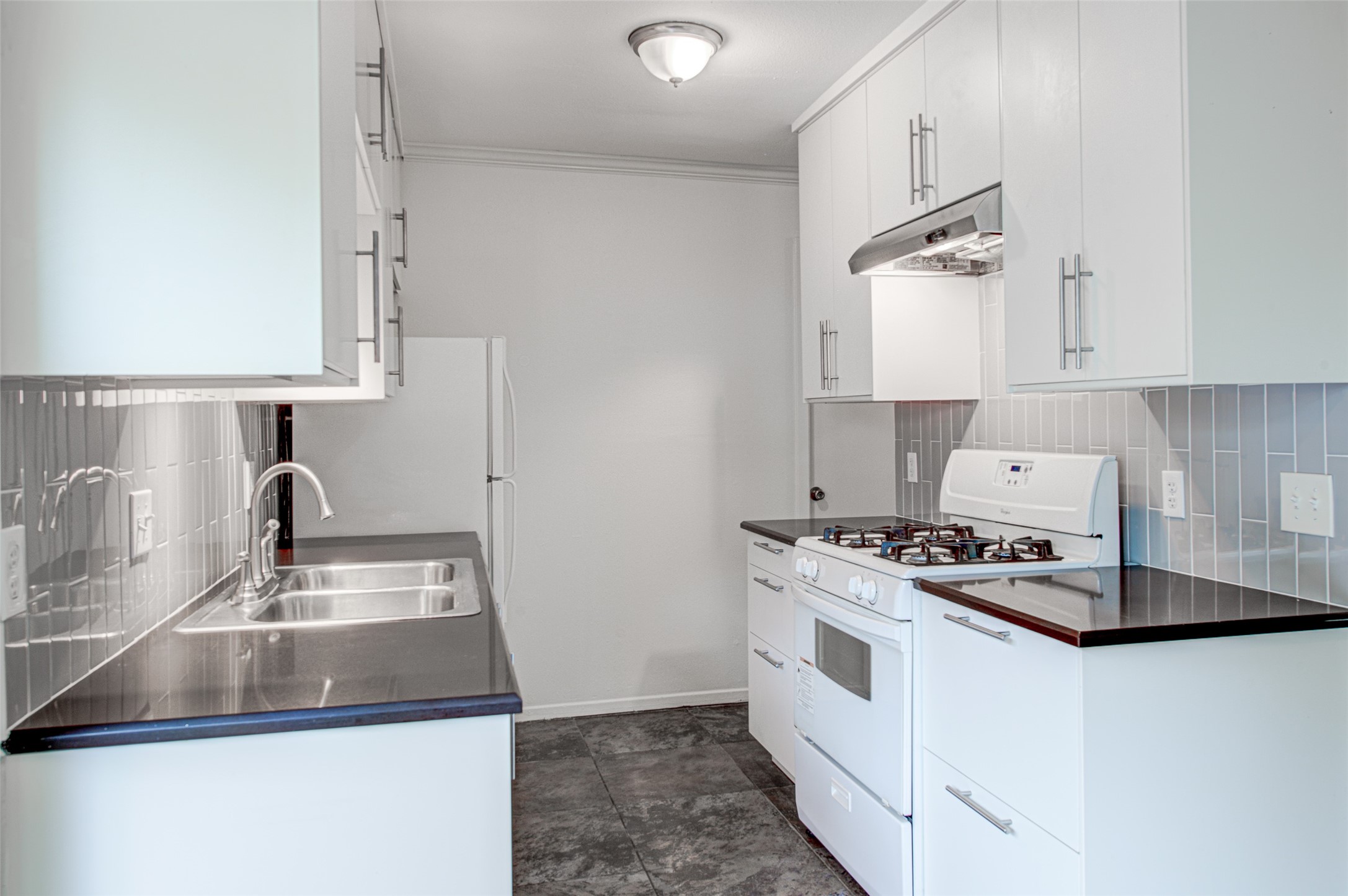 1403 Click Cove, Unit A Austin, TX 78758 - Photo 7 of 16 Stainless sink