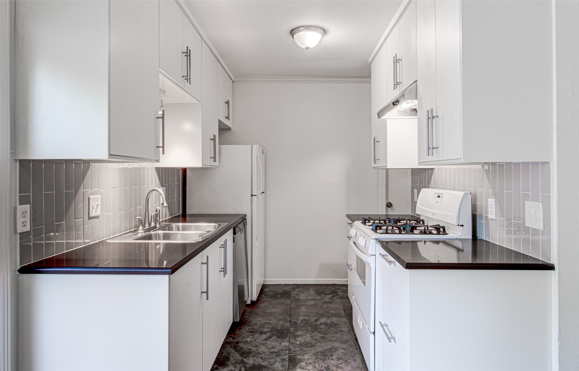 1403 Click Cove, Unit A Austin, TX 78758 - Photo 8 of 16 Tile backsplash