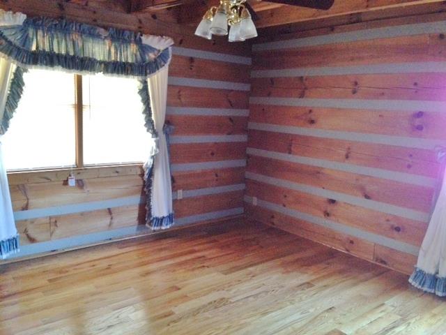 3545 3 Island Road Walling, TN 38587 - Photo 23 of 26 Larger main floor bedroom with window on front of home.