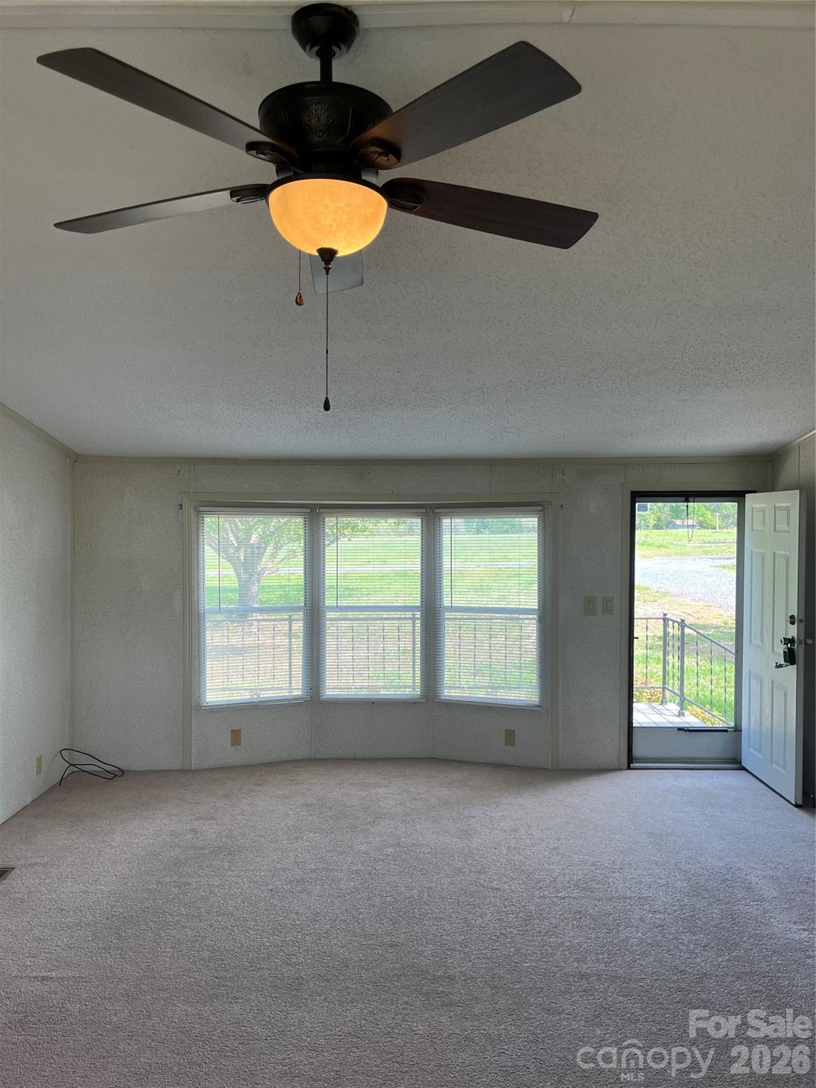 28616 Canton Road Albemarle, NC 28001 - Photo 17 of 31 a view of an empty room with a window