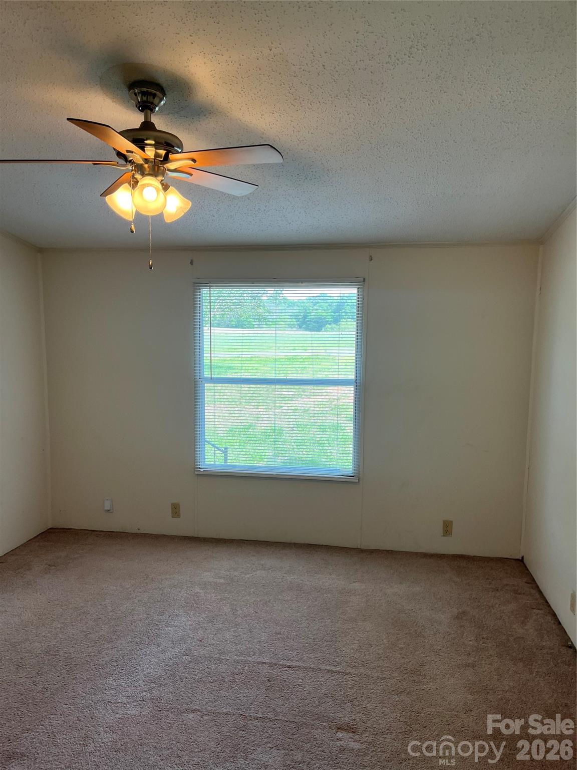 28616 Canton Road Albemarle, NC 28001 - Photo 24 of 31 an empty room with a window