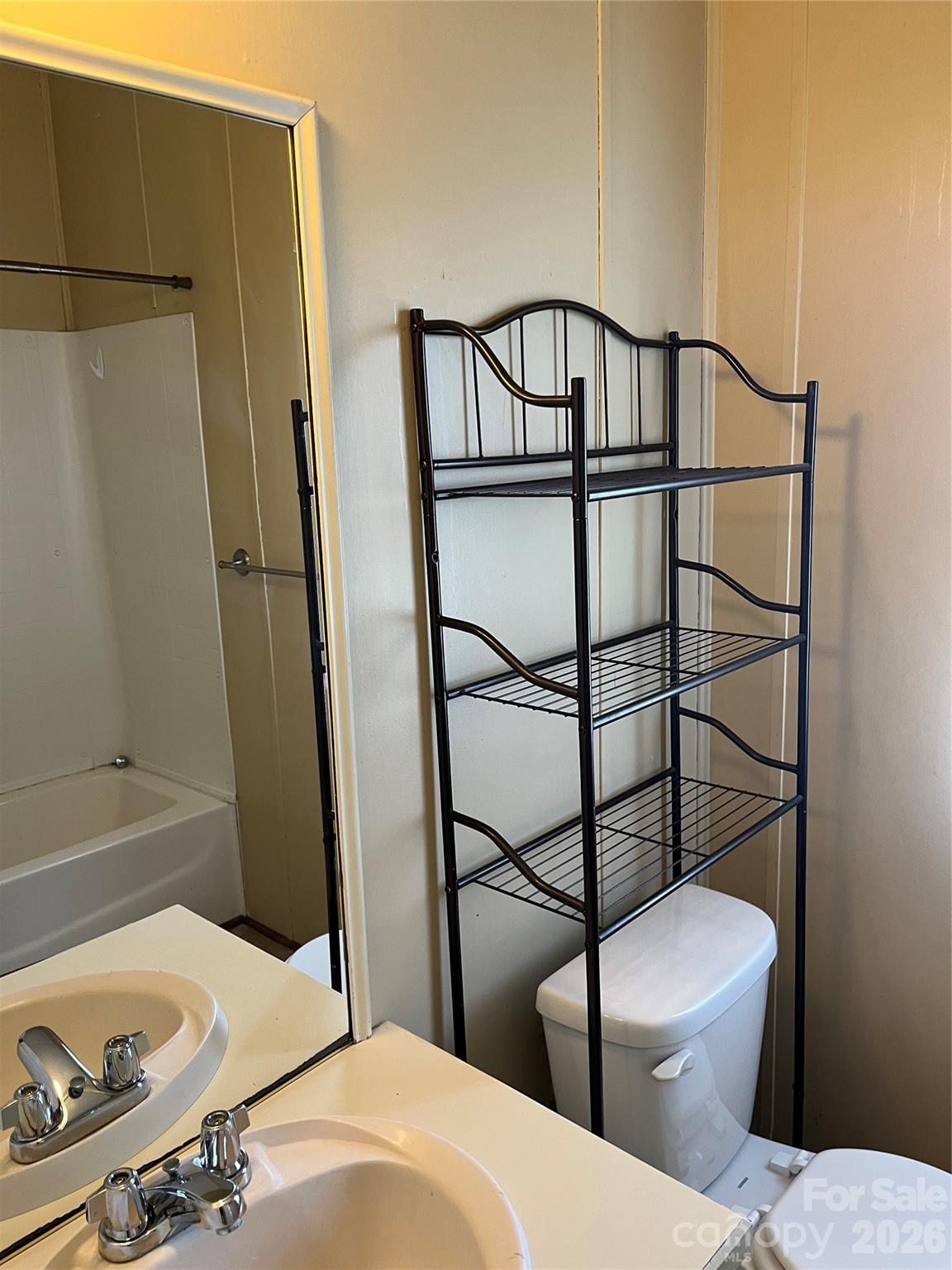 28616 Canton Road Albemarle, NC 28001 - Photo 27 of 31 a bathroom with a sink and a toilet