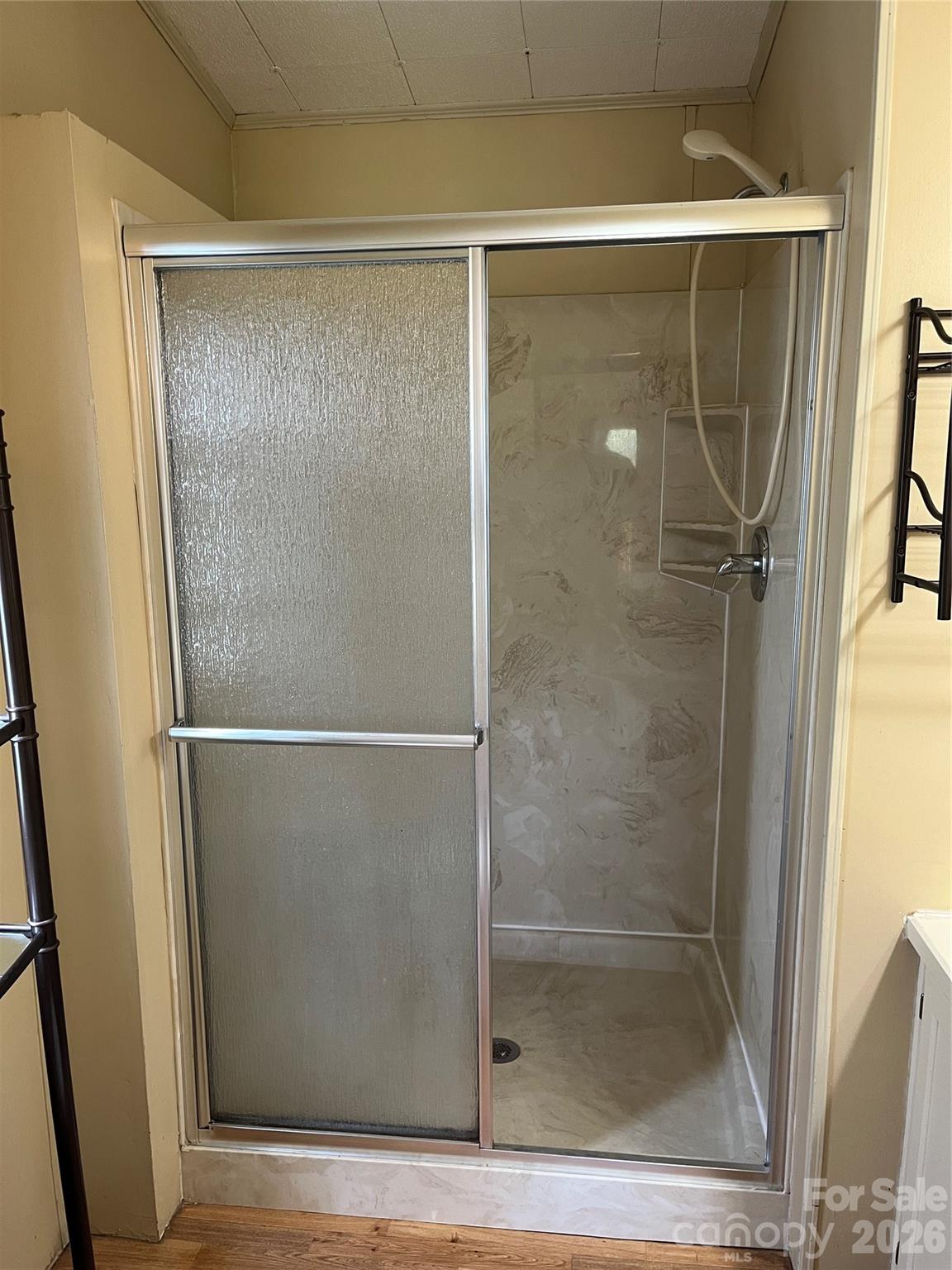28616 Canton Road Albemarle, NC 28001 - Photo 30 of 31 a bathroom with a glass shower door