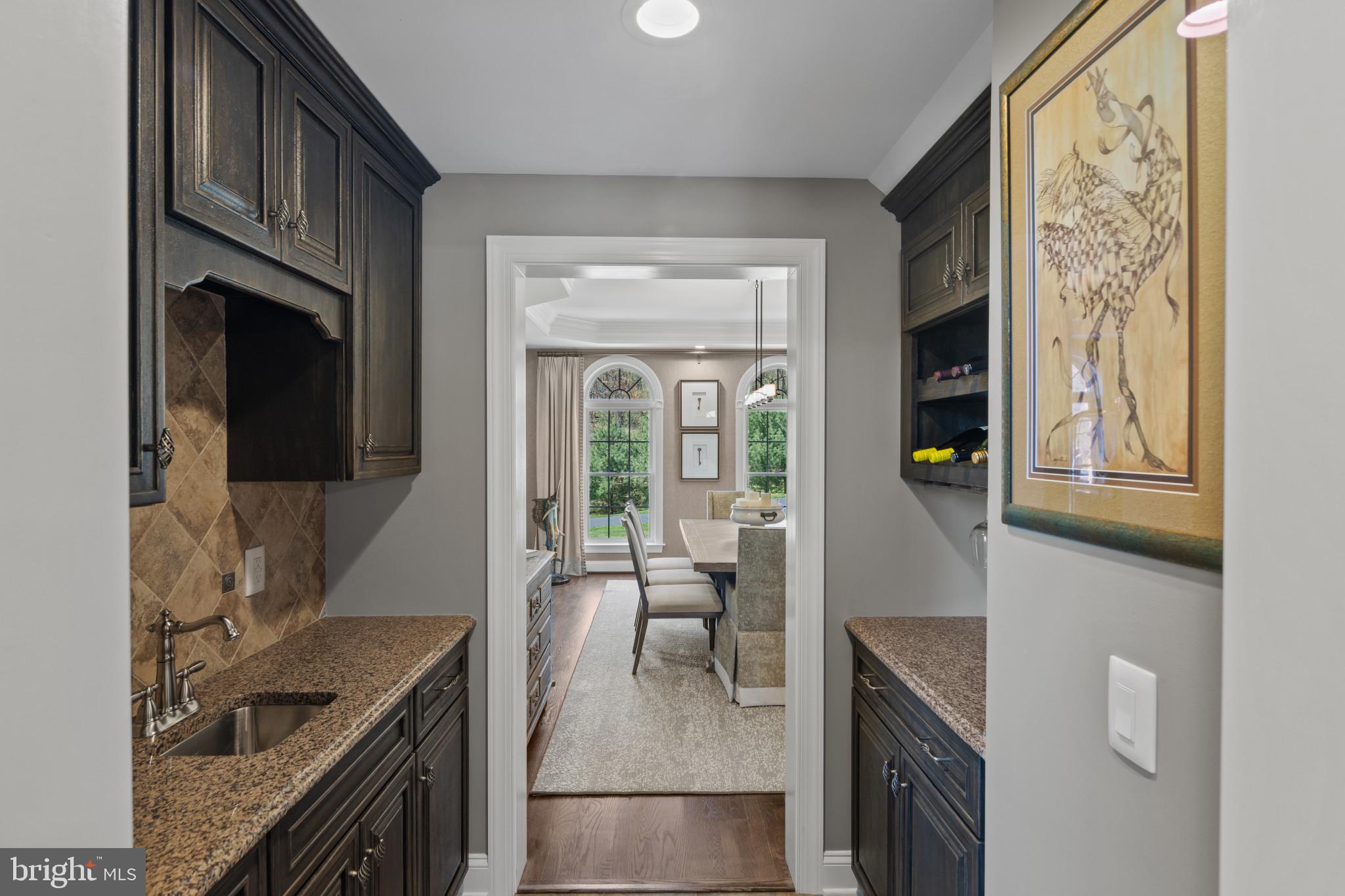 1140 Bernoudy Road White Hall, MD 21161 - Photo 17 of 81 a kitchen with granite countertop a stove and a sink
