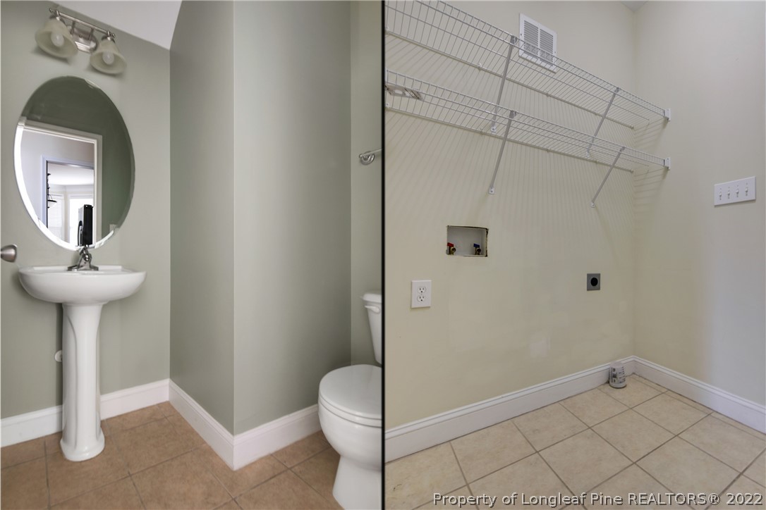 187 Lamplighter Way Spring Lake, NC 28390 - Photo 21 of 48 a bathroom with a sink a toilet and shower