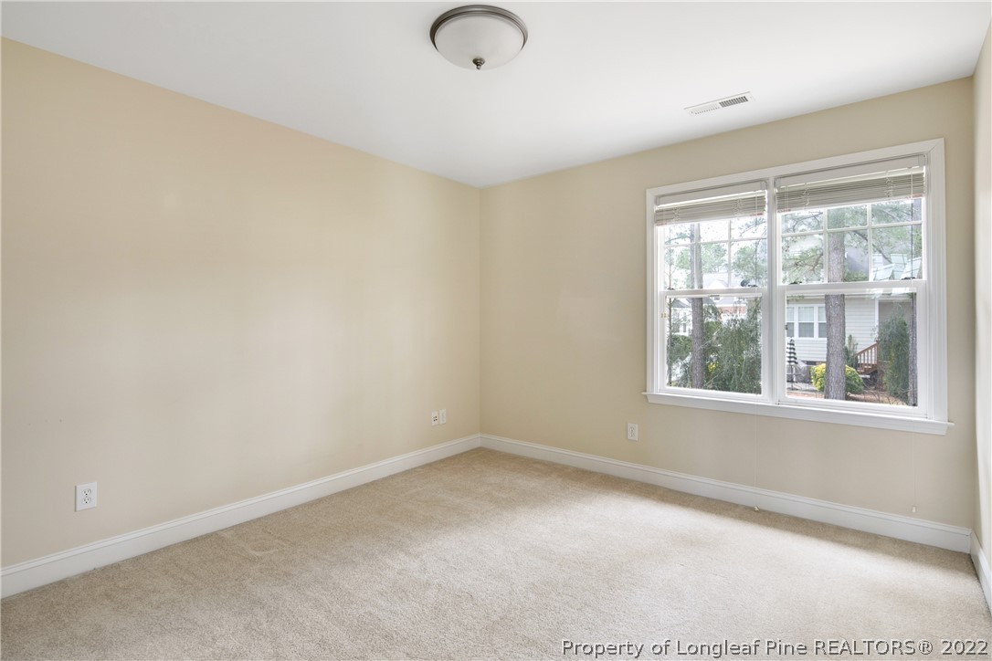 187 Lamplighter Way Spring Lake, NC 28390 - Photo 36 of 48 an empty room with a window