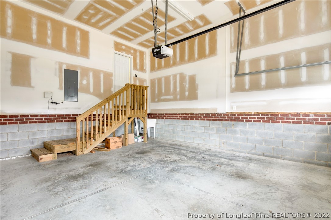 187 Lamplighter Way Spring Lake, NC 28390 - Photo 45 of 48 a view of staircase with railing and white walls