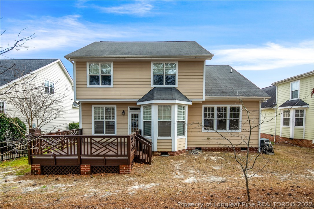 187 Lamplighter Way Spring Lake, NC 28390 - Photo 46 of 48 a front view of a house with a yard