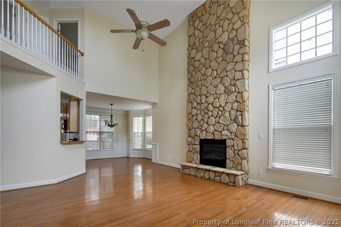 187 Lamplighter Way Spring Lake, NC 28390 - Photo 6 of 48 a view of an empty room with a window and fireplace
