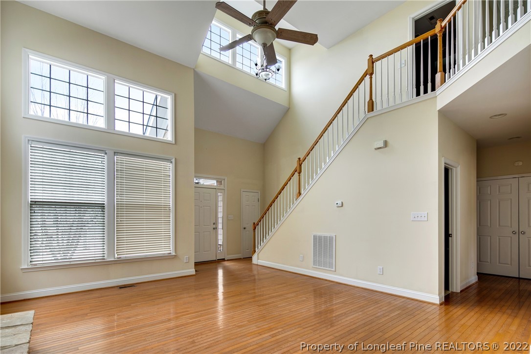 187 Lamplighter Way Spring Lake, NC 28390 - Photo 8 of 48 a view of an entryway with wooden floor and stairs