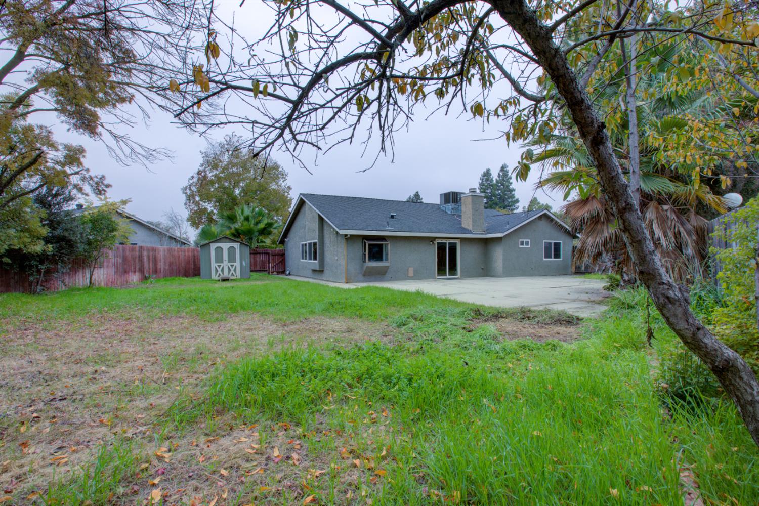 3772 Duke Court Merced, CA 95348 - Photo 33 of 40 a view of an house with backyard space and garden