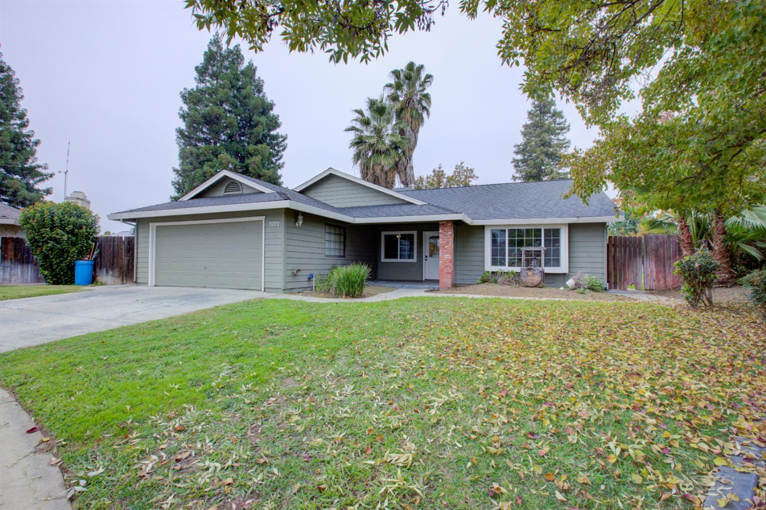 3772 Duke Court Merced, CA 95348 - Photo 34 of 40 a front view of a house with a garden
