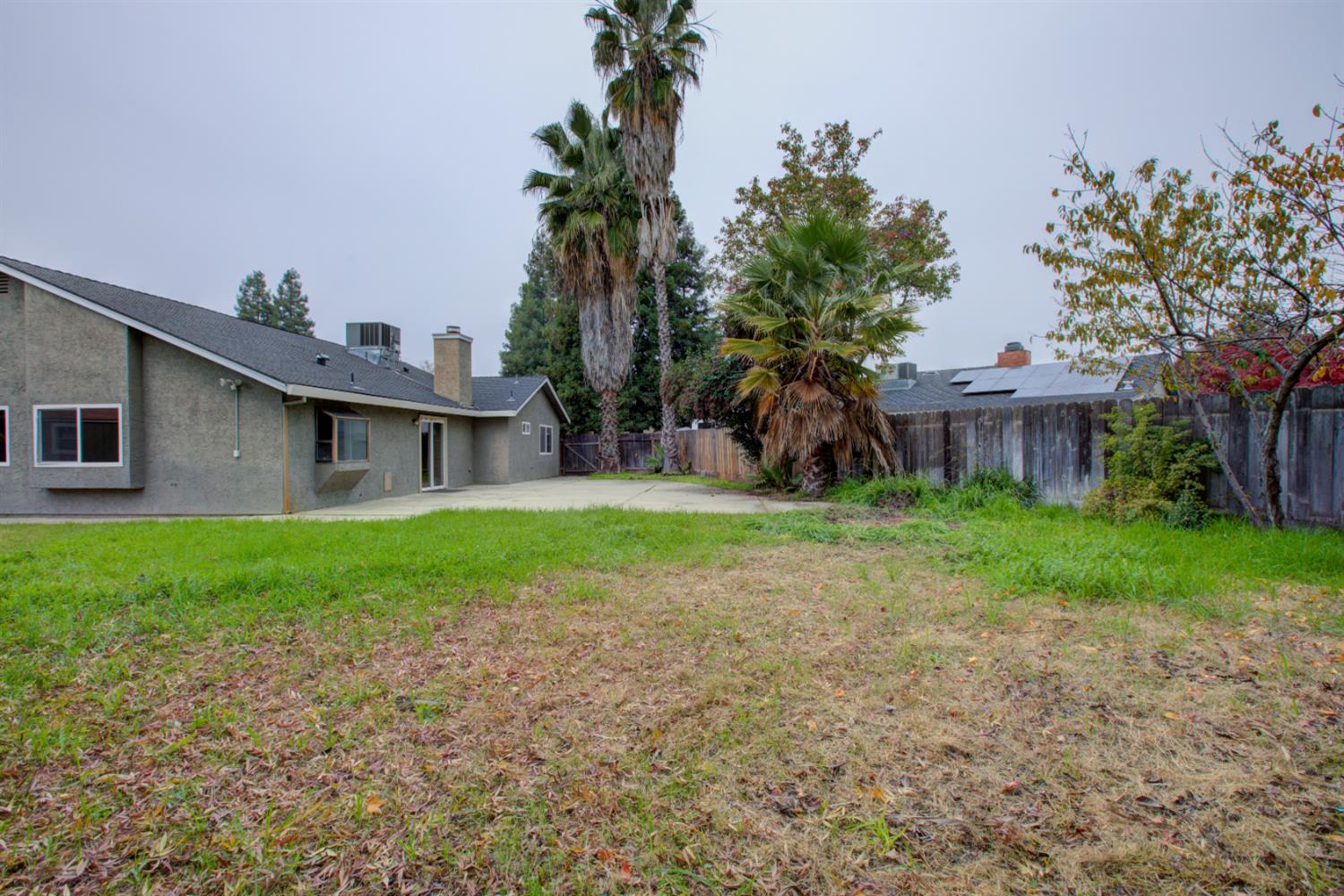 3772 Duke Court Merced, CA 95348 - Photo 37 of 40 a view of a house with yard and tree s