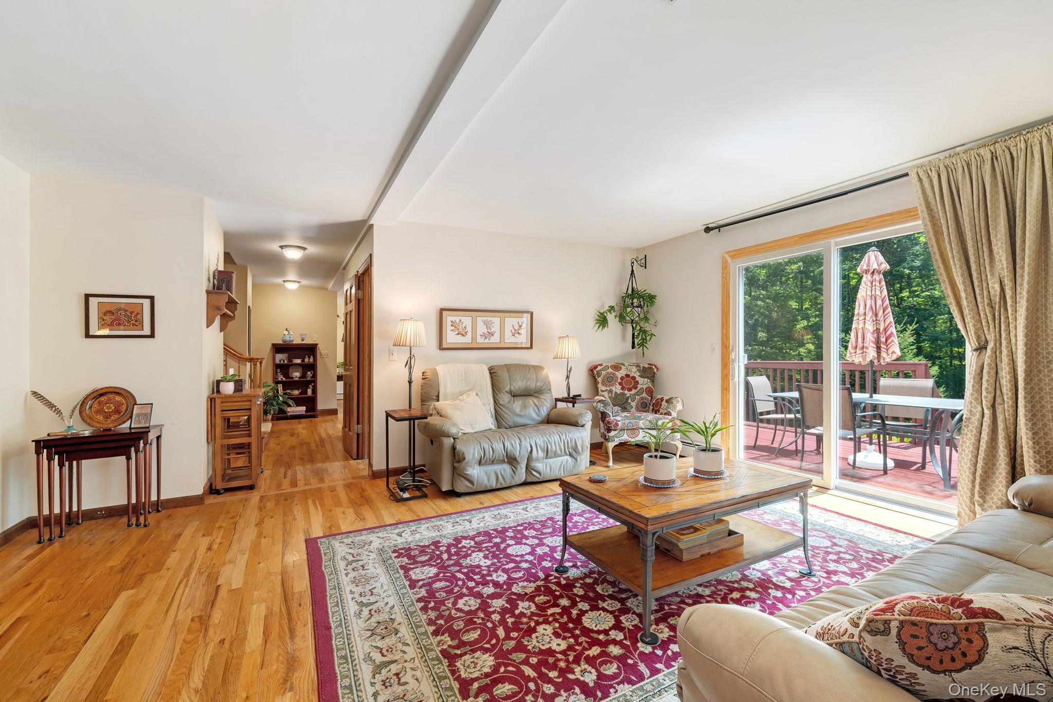 339 Kirbytown Road Middletown, NY 10940 - Photo 11 of 44 a living room with furniture and a table