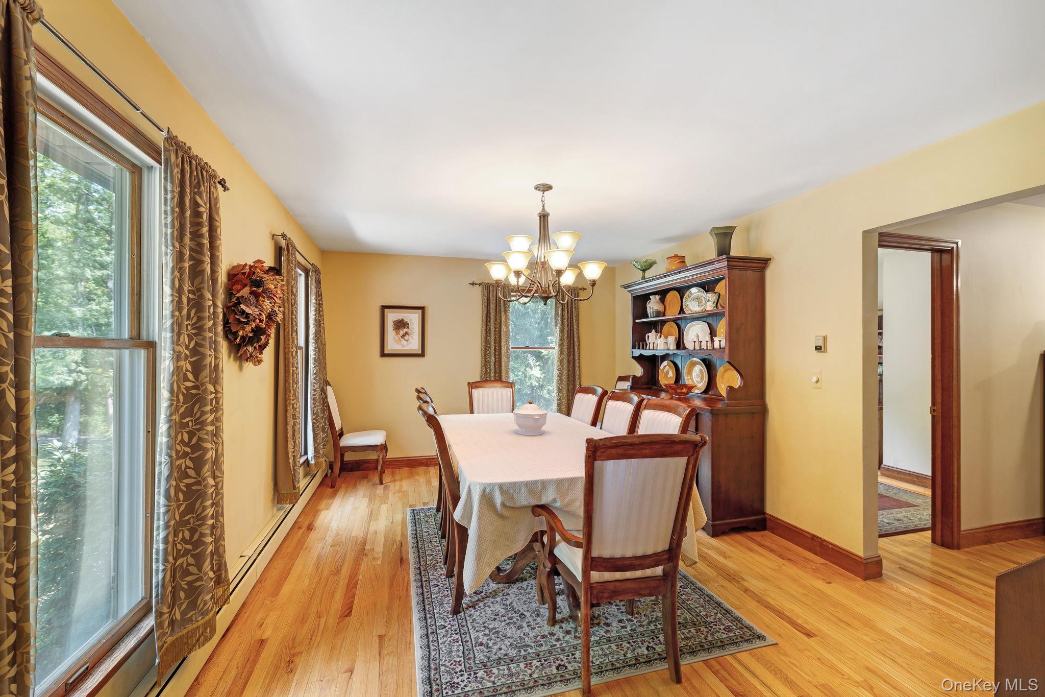 339 Kirbytown Road Middletown, NY 10940 - Photo 12 of 44 a view of a dining room with furniture window and wooden floor