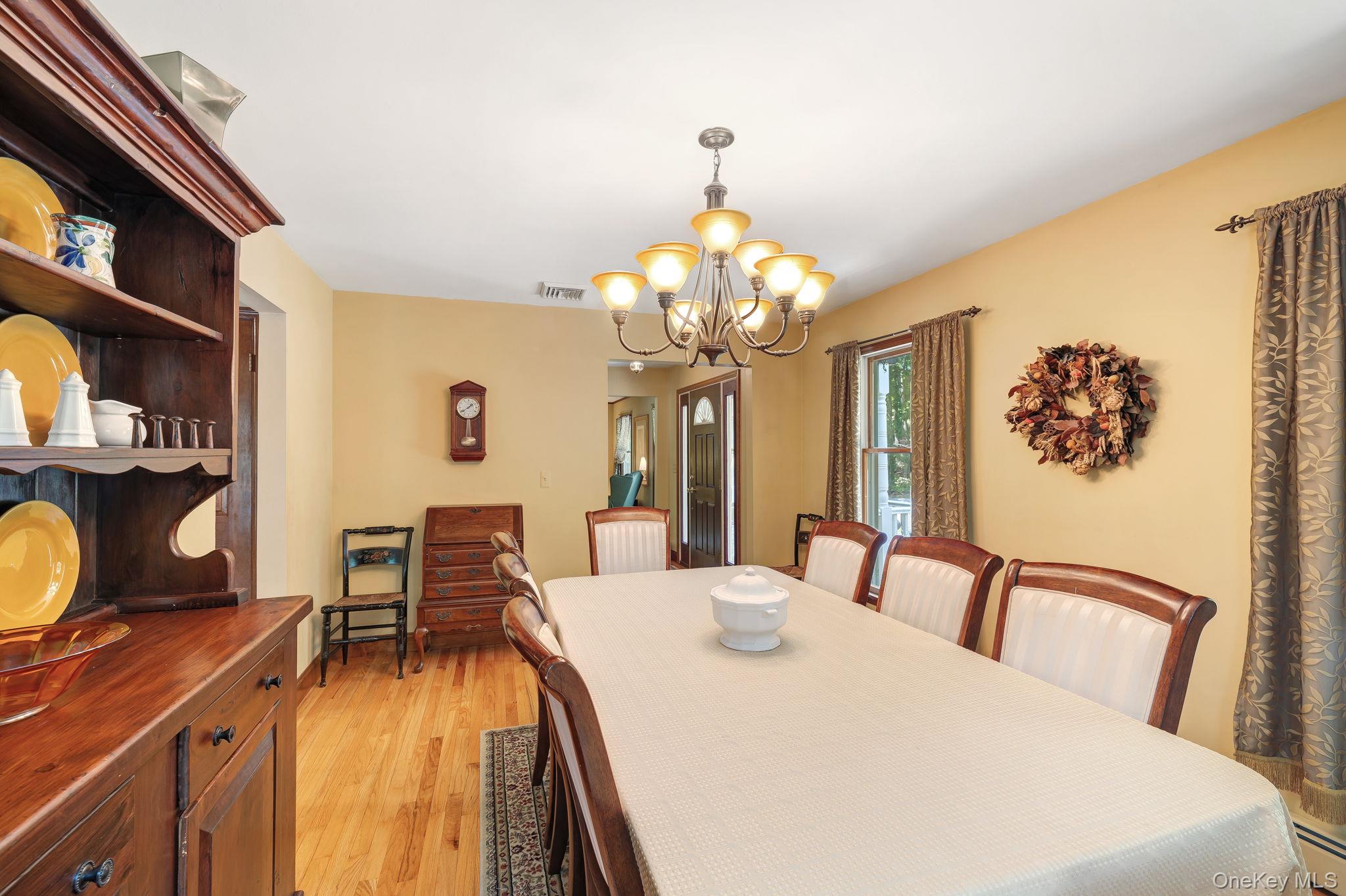 339 Kirbytown Road Middletown, NY 10940 - Photo 14 of 44 a living room with dining table and chairs