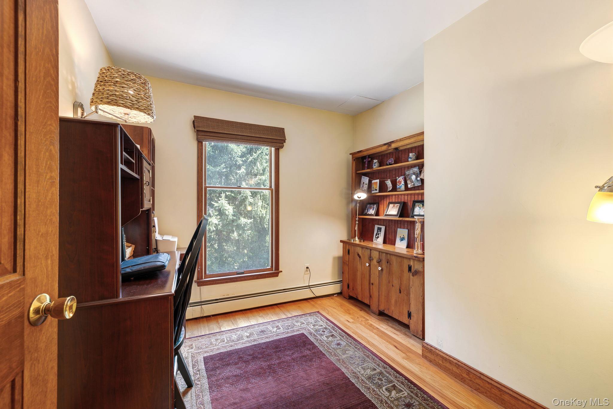 339 Kirbytown Road Middletown, NY 10940 - Photo 15 of 44 a view of workspace with wooden floor and windows