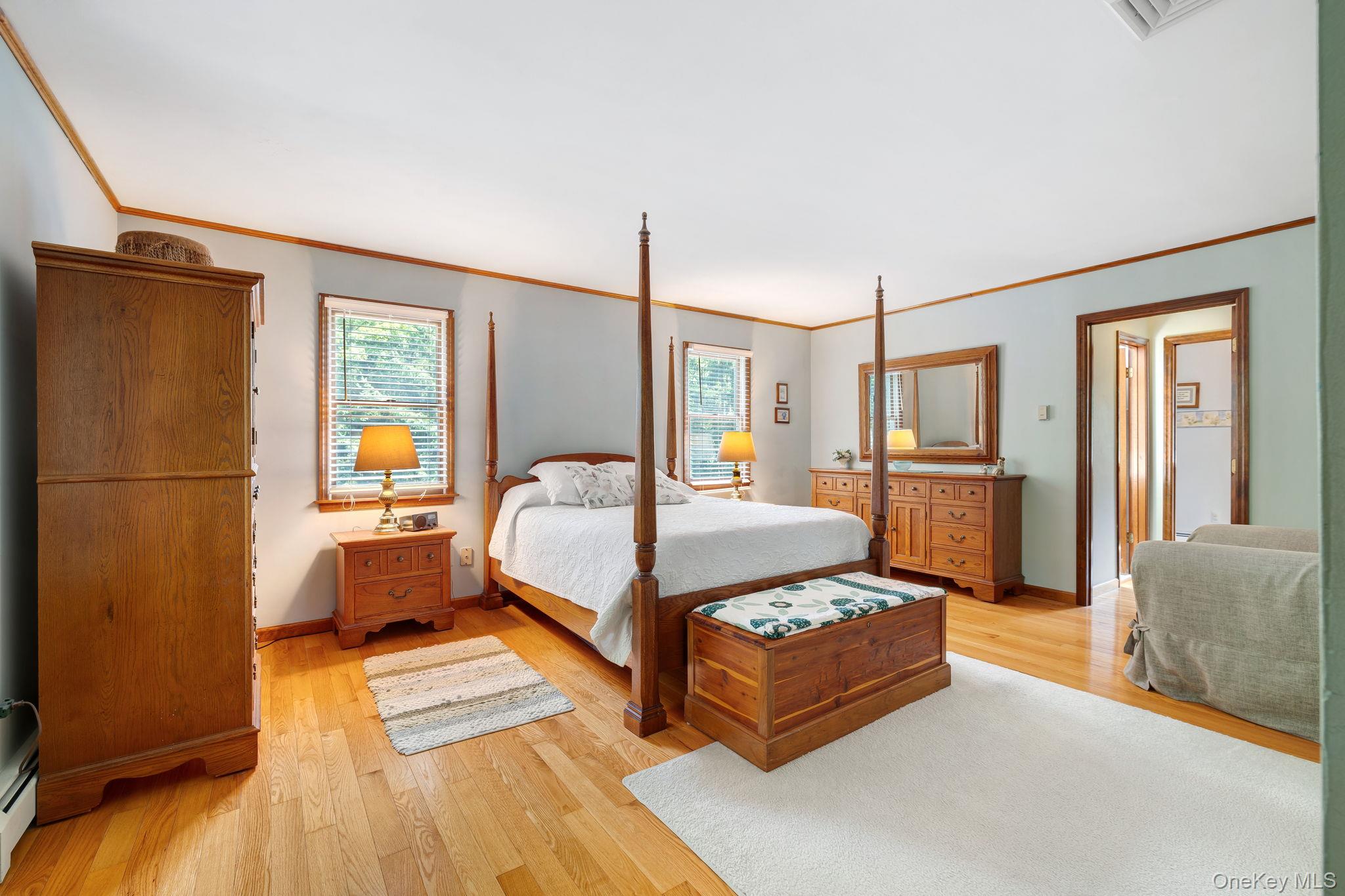 339 Kirbytown Road Middletown, NY 10940 - Photo 19 of 44 a spacious bedroom with a bed couch and a dresser