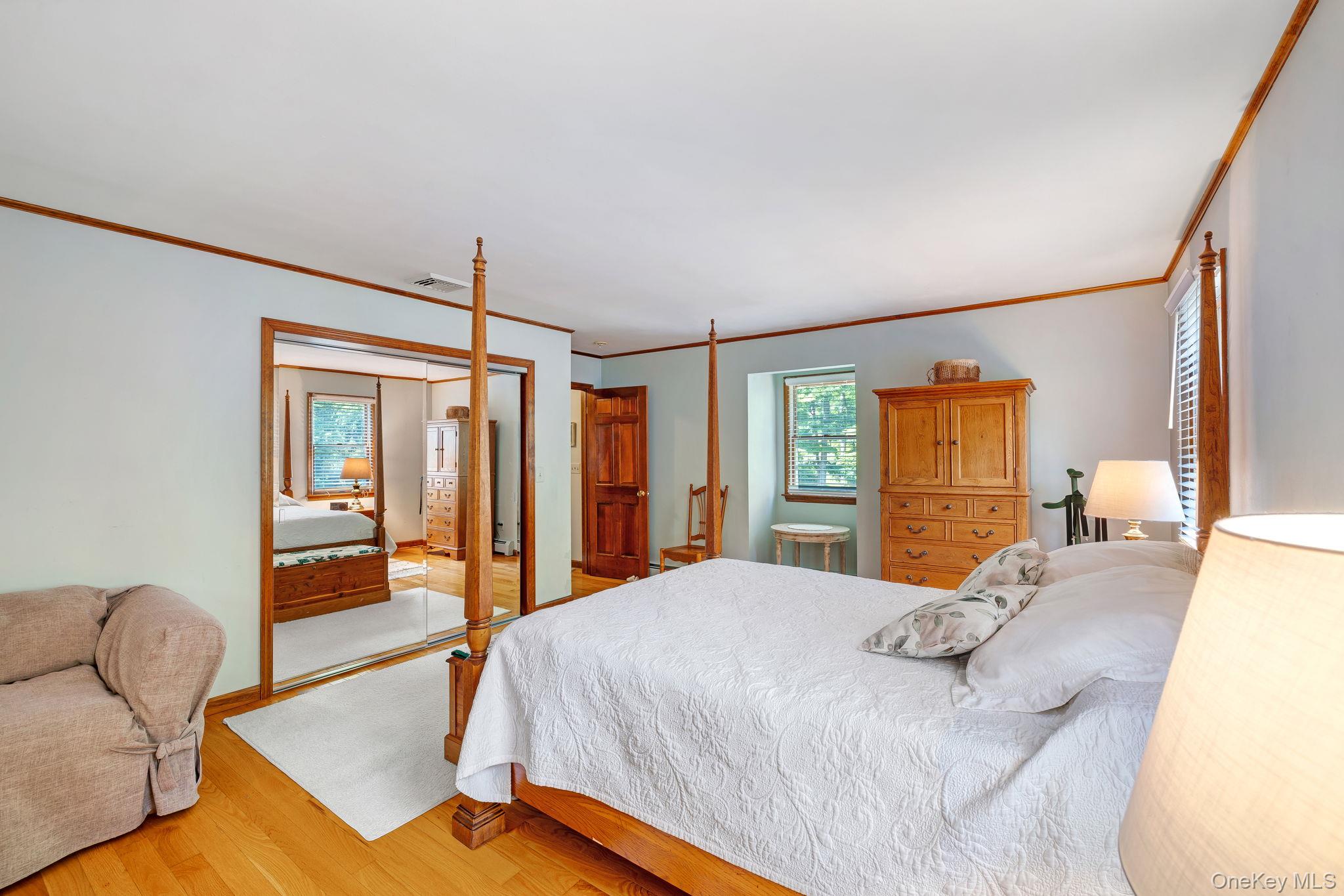 339 Kirbytown Road Middletown, NY 10940 - Photo 20 of 44 a bedroom with a bed and wooden floor