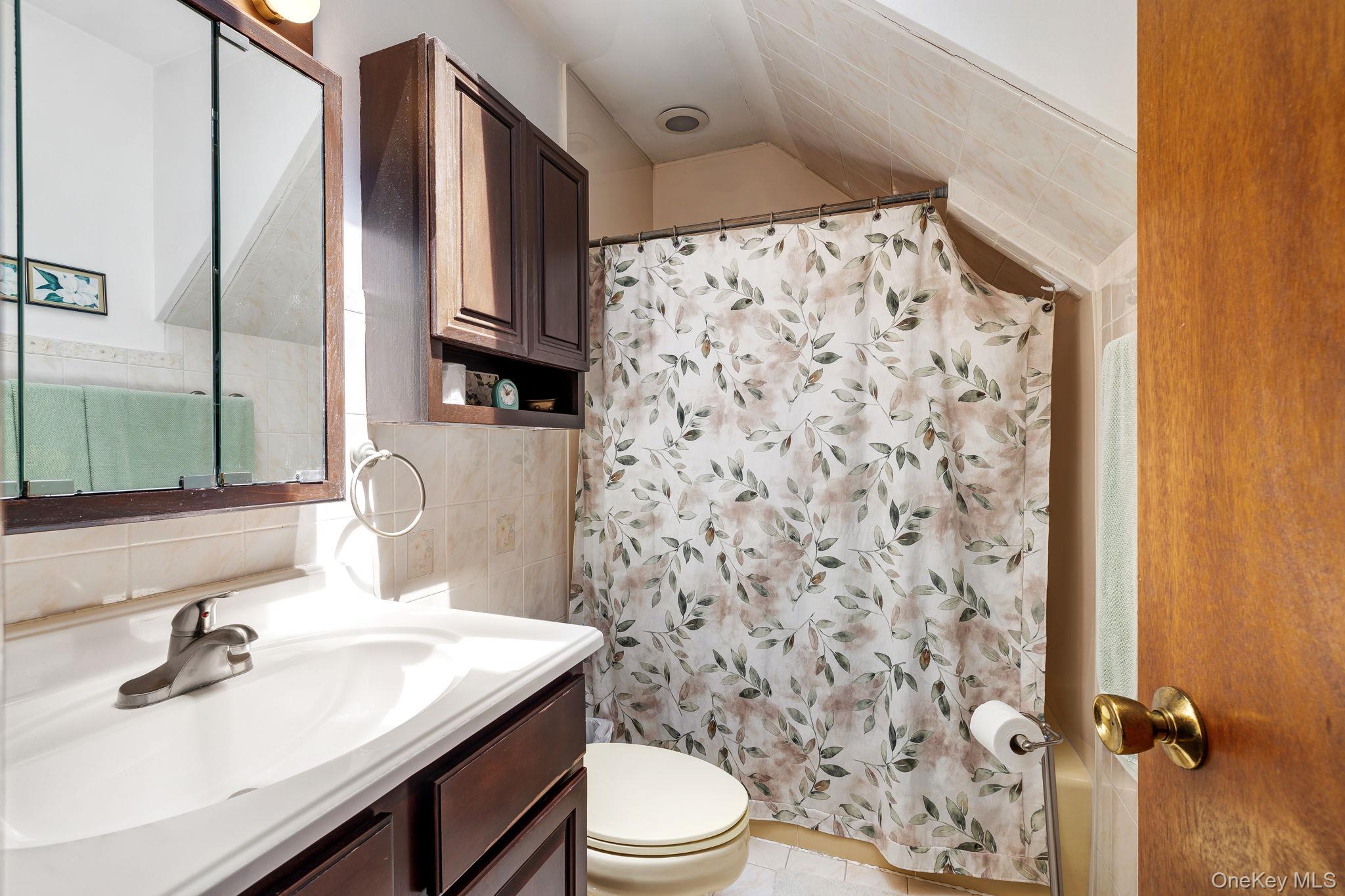 339 Kirbytown Road Middletown, NY 10940 - Photo 21 of 44 a bathroom with a sink toilet and shower