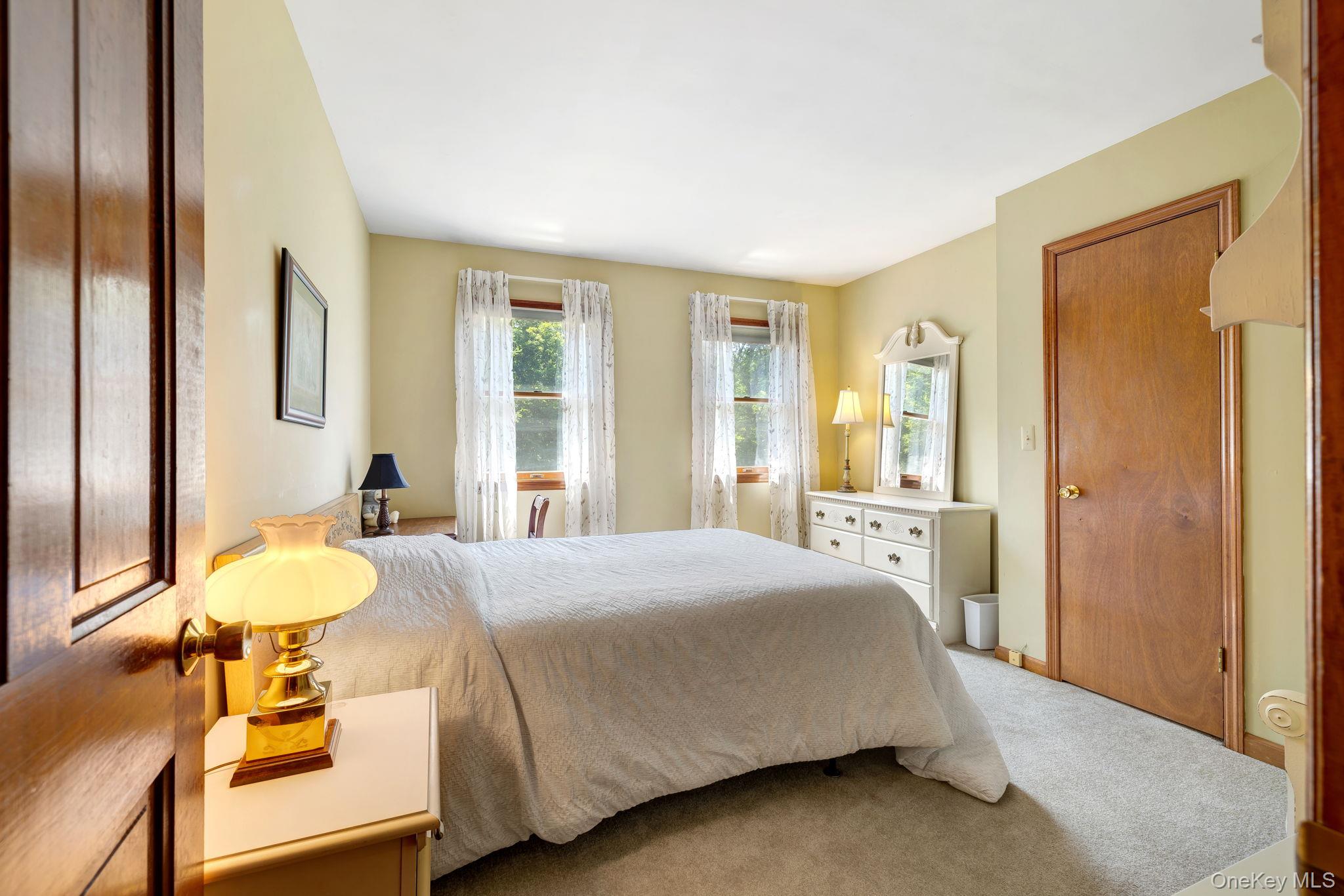 339 Kirbytown Road Middletown, NY 10940 - Photo 24 of 44 a bedroom with a bed and wooden floor