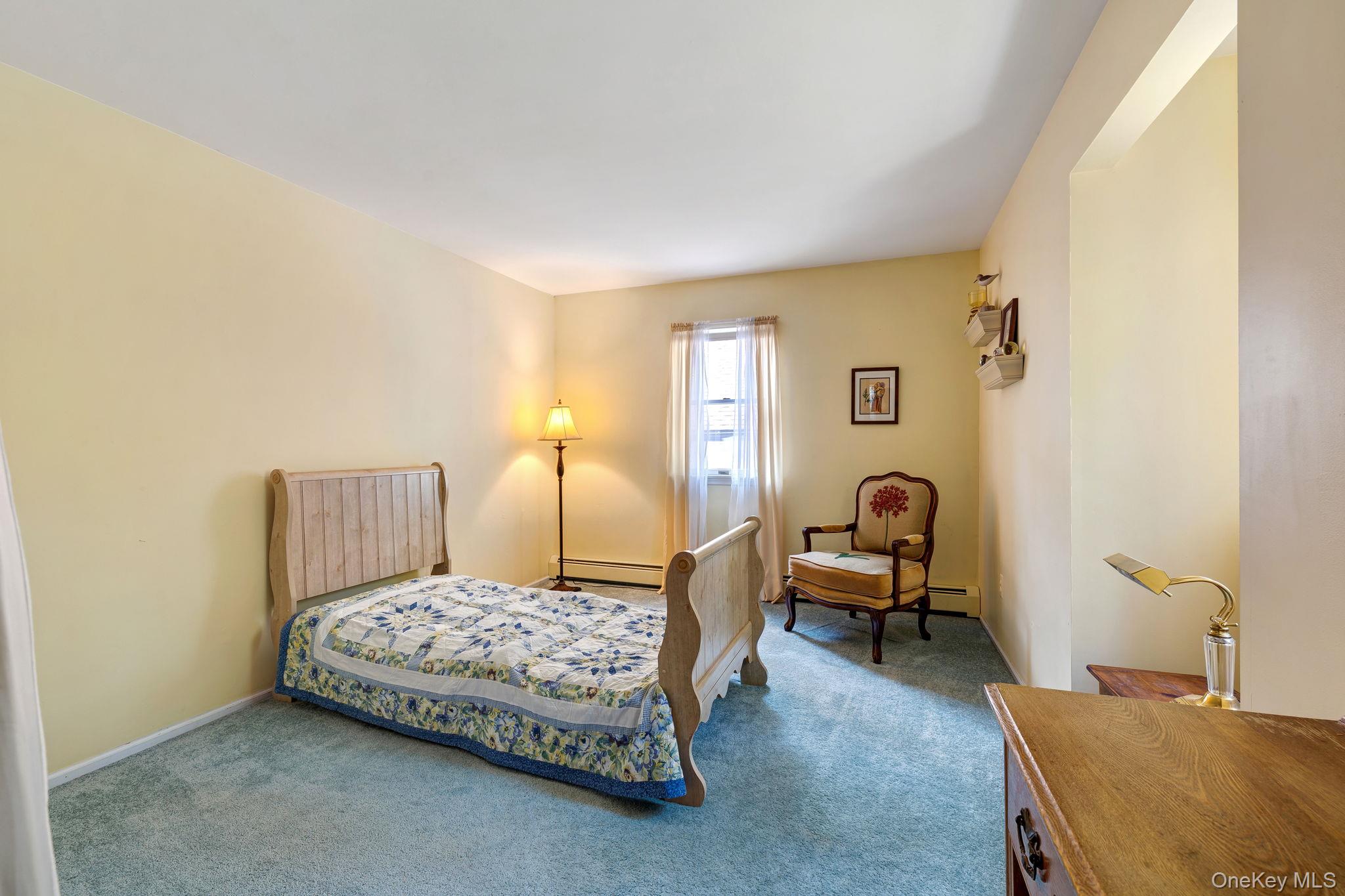 339 Kirbytown Road Middletown, NY 10940 - Photo 25 of 44 a bedroom with a bed and a table in it