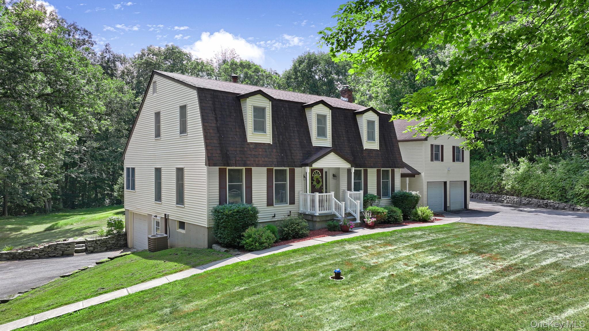 339 Kirbytown Road Middletown, NY 10940 - Photo 38 of 44 a front view of a house with garden