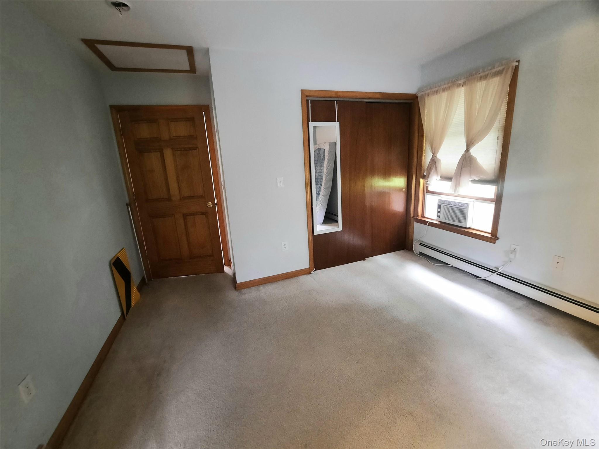 339 Kirbytown Road Middletown, NY 10940 - Photo 41 of 44 an empty room with windows and closet