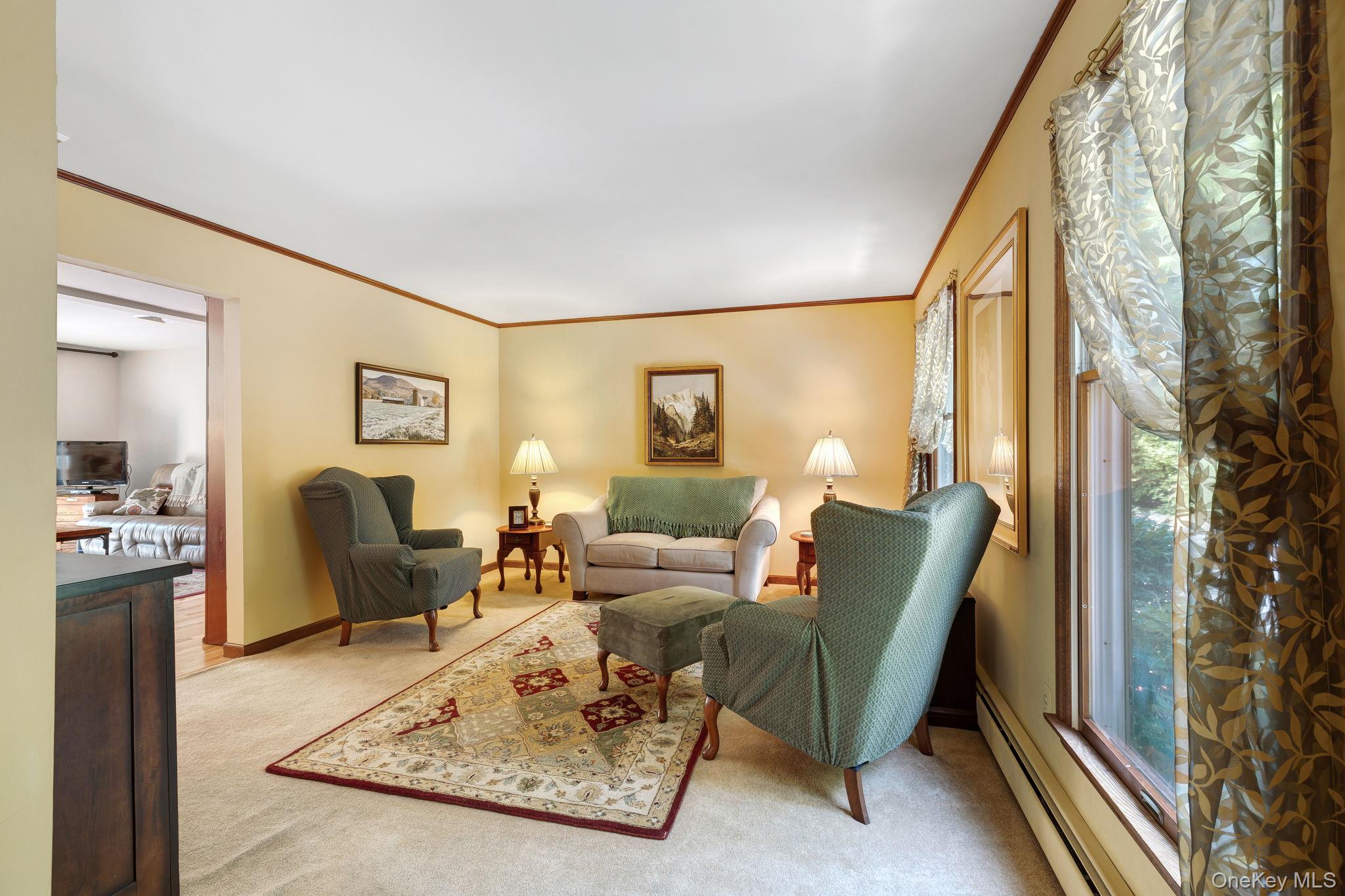 339 Kirbytown Road Middletown, NY 10940 - Photo 9 of 44 a living room with furniture and a large window