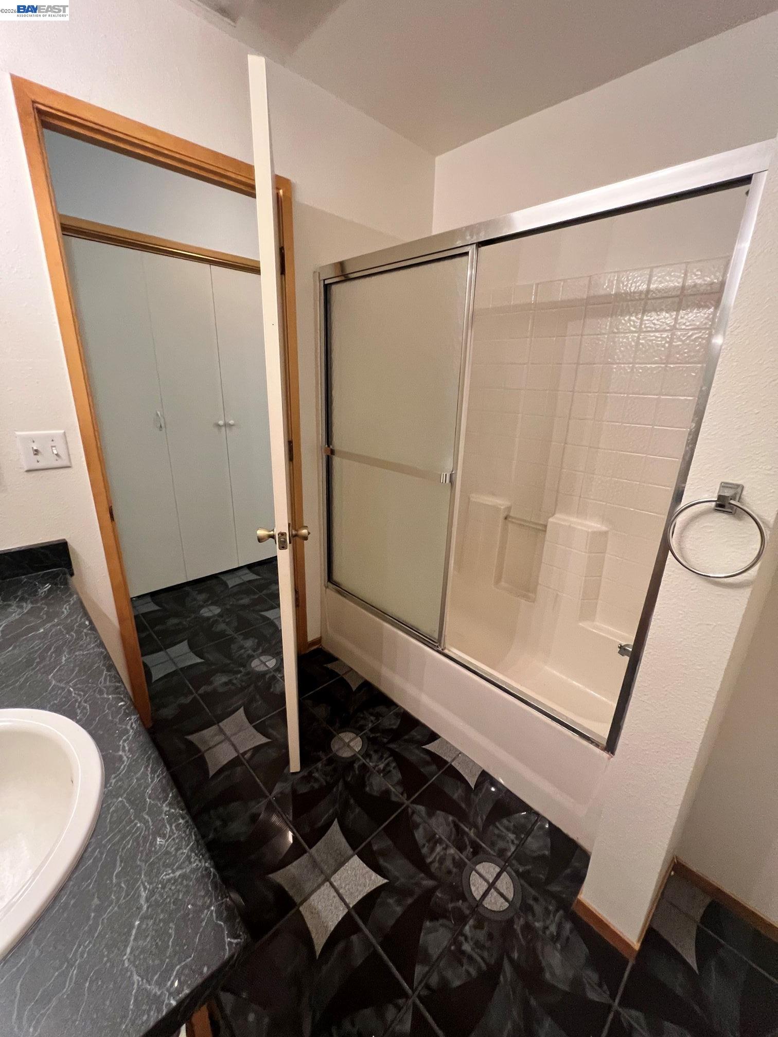 192 Torvend Way Patterson, CA 95363 - Photo 25 of 29 a bathroom with a shower and a sink