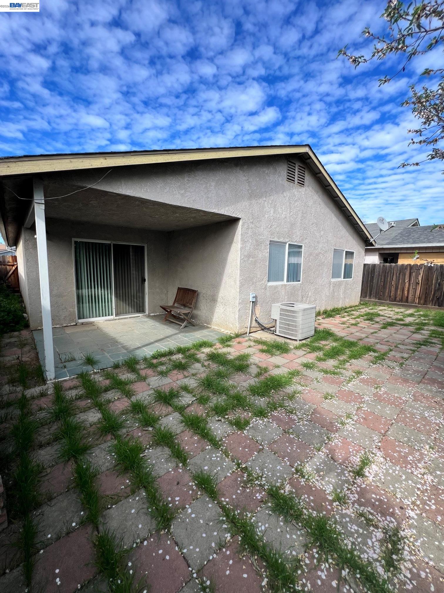 192 Torvend Way Patterson, CA 95363 - Photo 27 of 29 a house with trees in the background