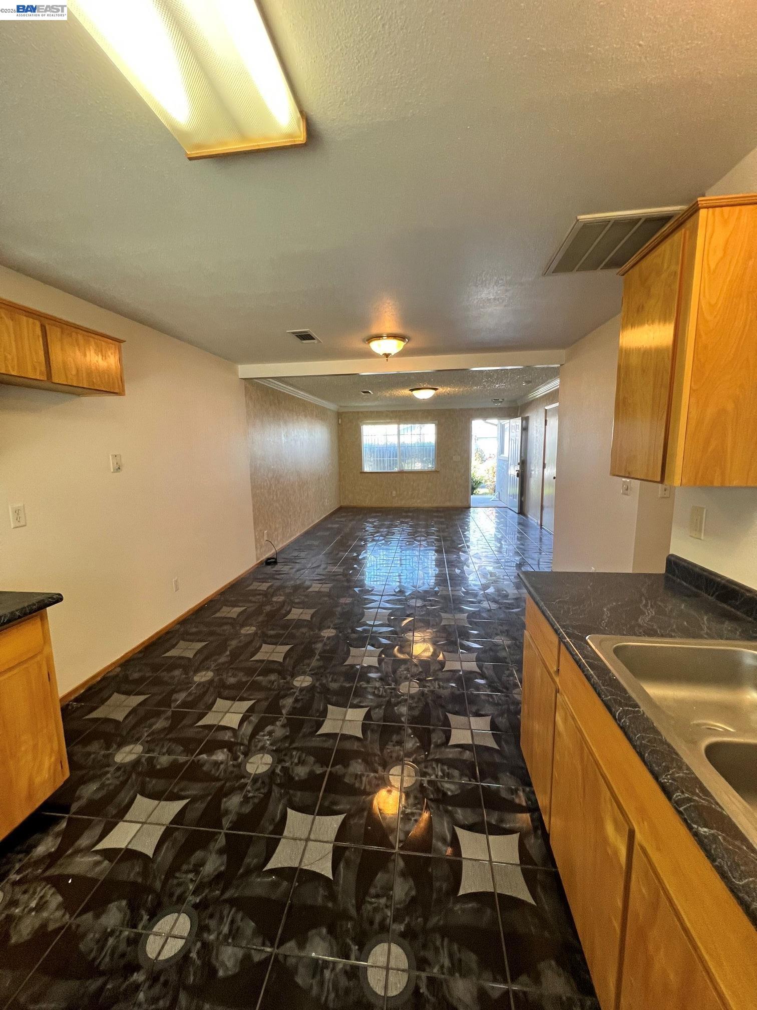 192 Torvend Way Patterson, CA 95363 - Photo 10 of 29 a bathroom with a sink and a shower