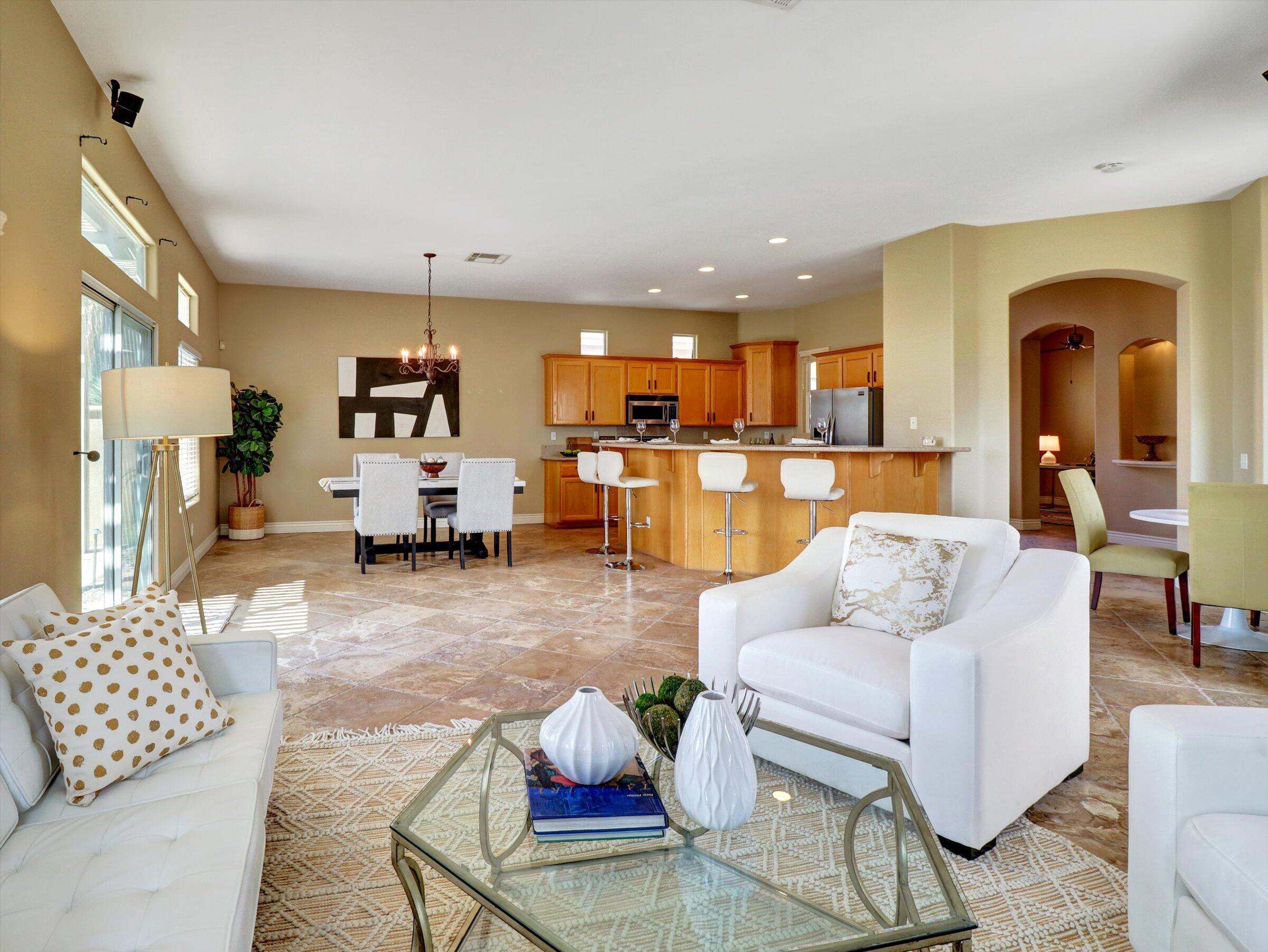82809 Odlum Drive Indio, CA 92201 - Photo 12 of 57 a living room with furniture and kitchen view