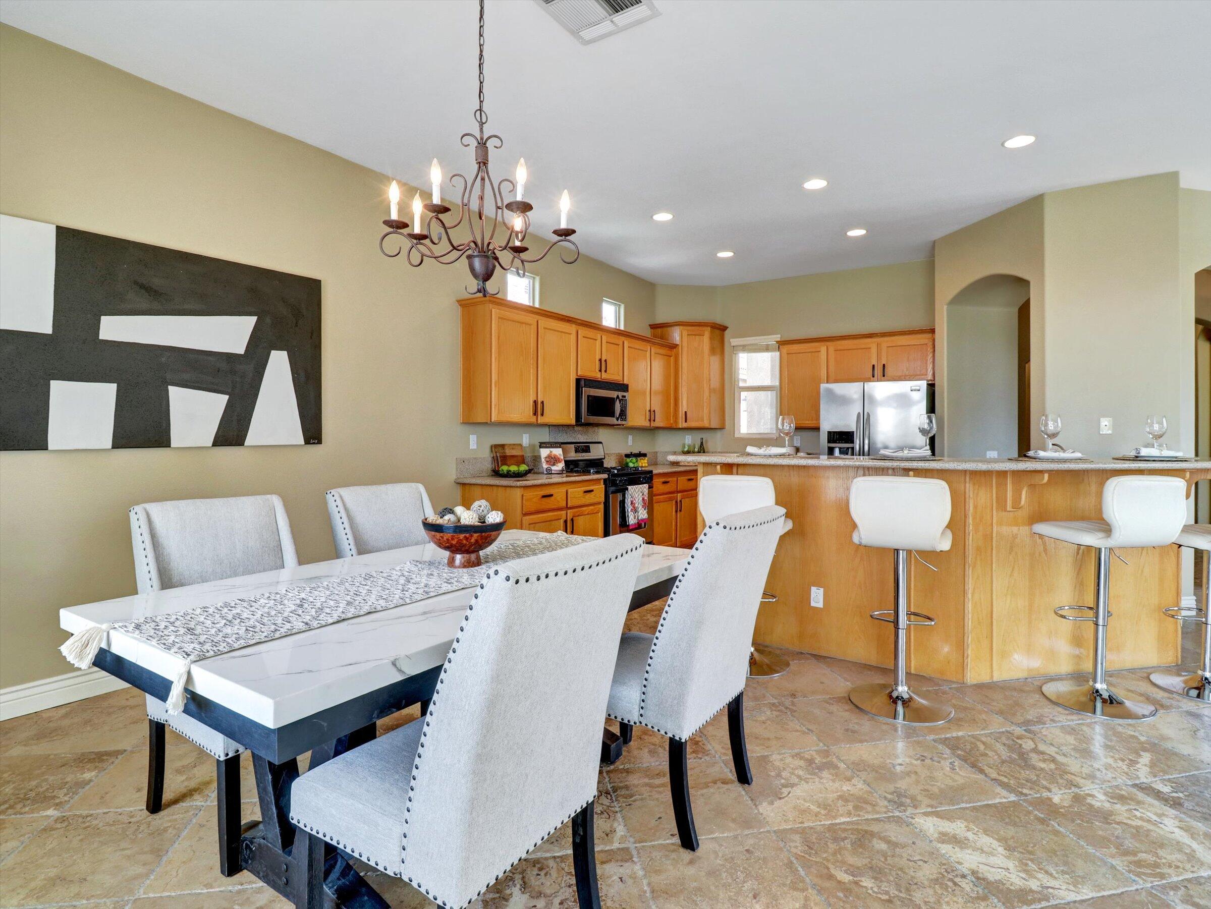 82809 Odlum Drive Indio, CA 92201 - Photo 16 of 57 a view of a dining room with furniture