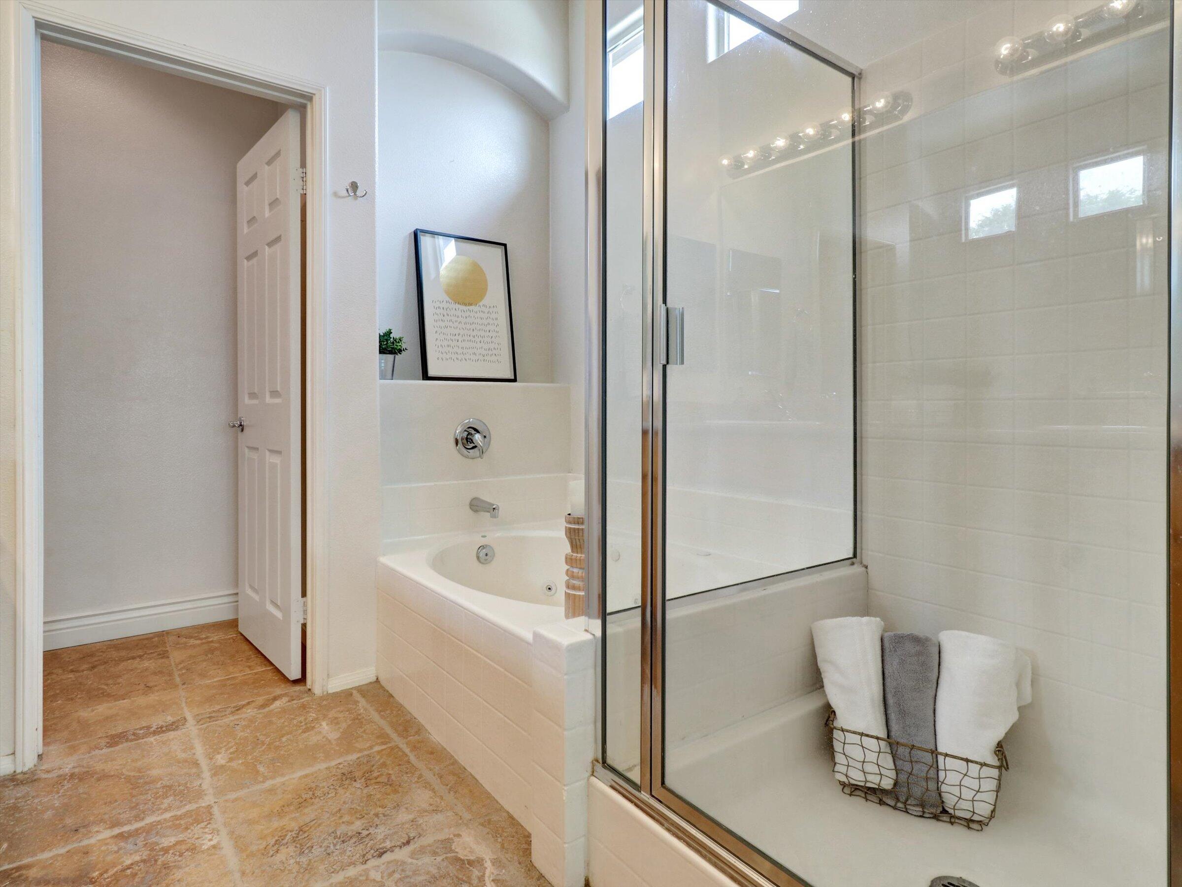 82809 Odlum Drive Indio, CA 92201 - Photo 26 of 57 a bathroom with a tub shower and a sink