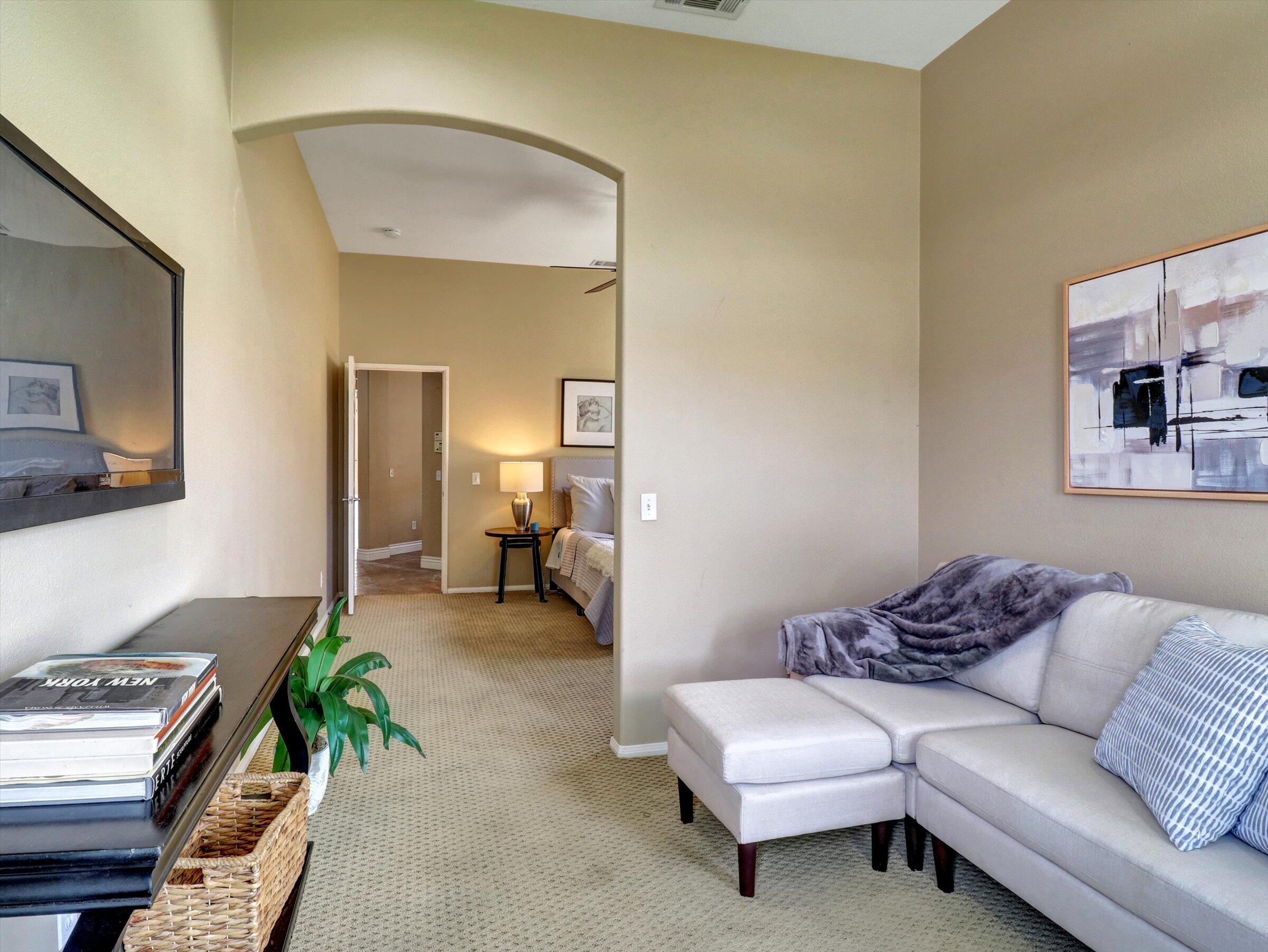 82809 Odlum Drive Indio, CA 92201 - Photo 34 of 57 a living room with furniture and a couch