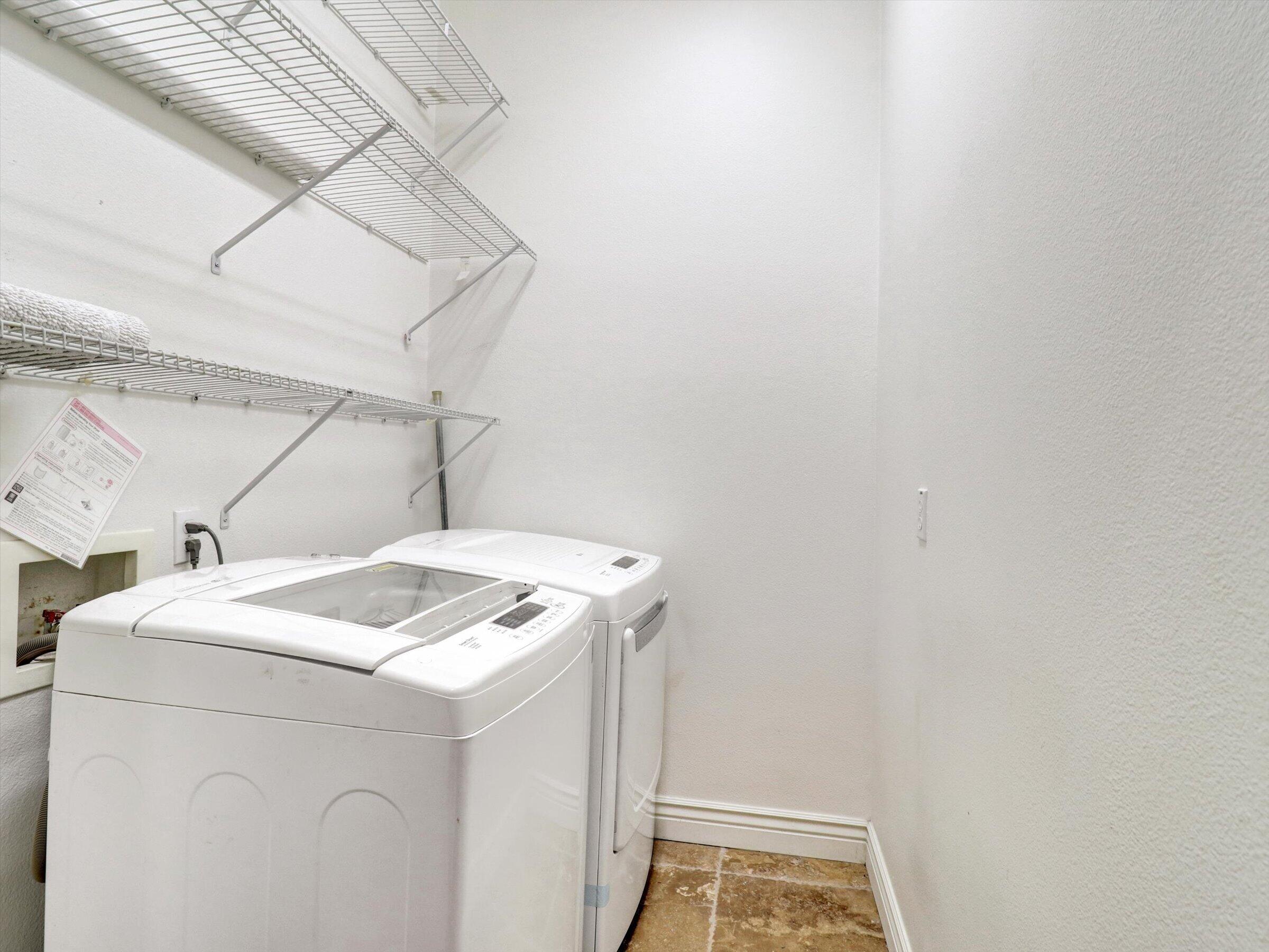 82809 Odlum Drive Indio, CA 92201 - Photo 36 of 57 a utility room with dryer and washer