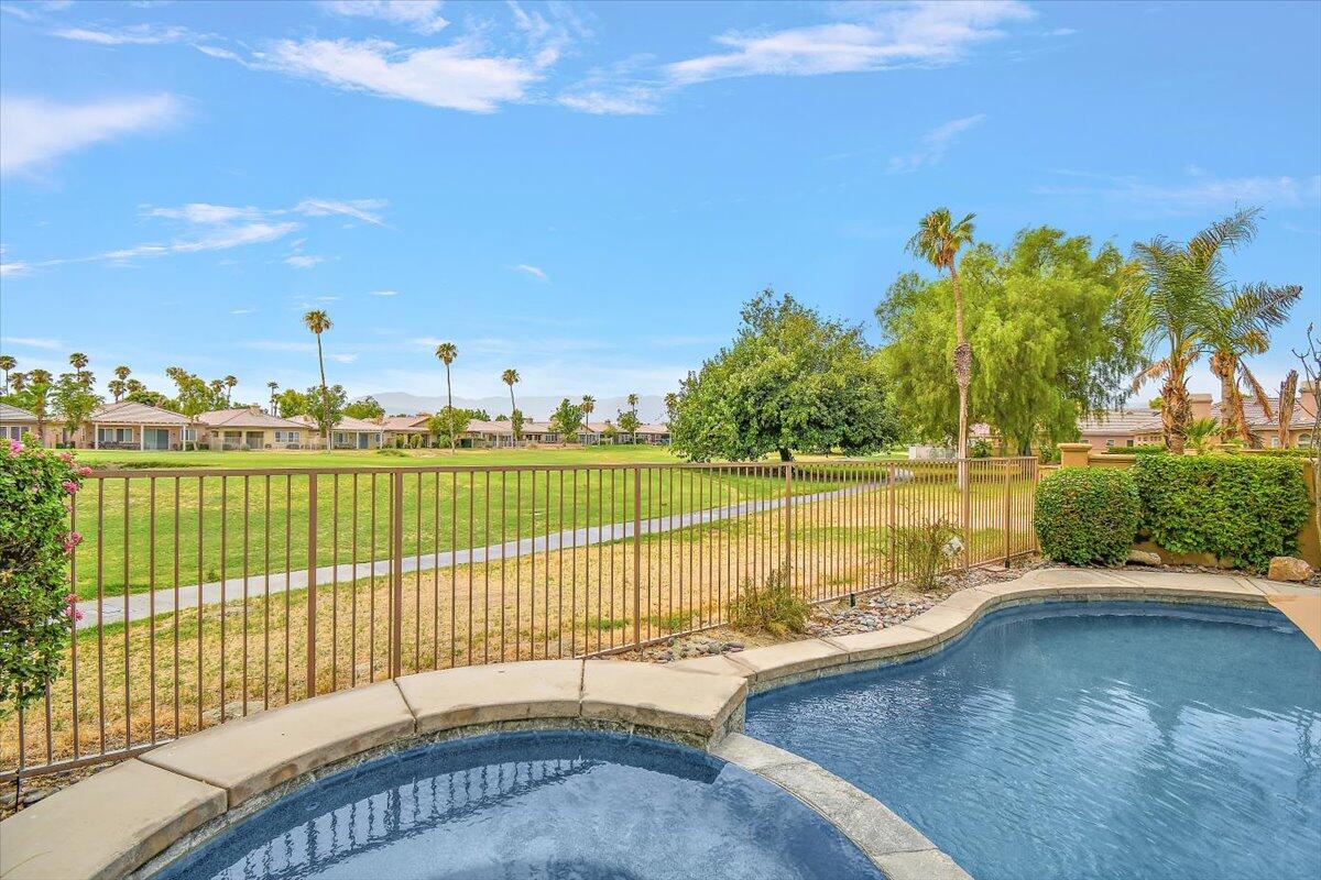 82809 Odlum Drive Indio, CA 92201 - Photo 43 of 57 a view of a swimming pool with a lake view
