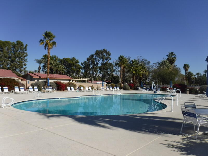 82809 Odlum Drive Indio, CA 92201 - Photo 56 of 57 a view of a swimming pool with a garden