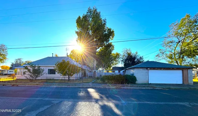 a view of a house with a street