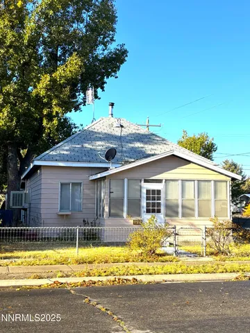 a view of a house with a swimming pool